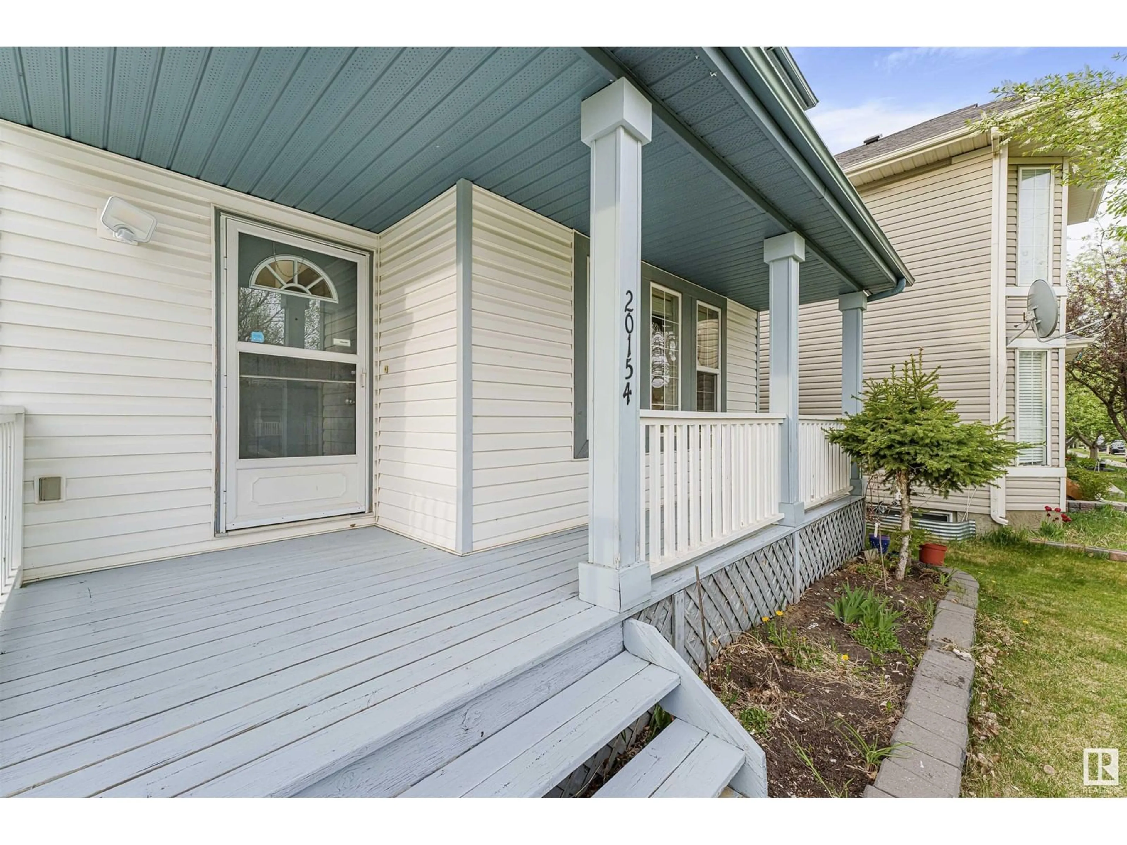Home with vinyl exterior material, street for 20154 53 AV, Edmonton Alberta T6M2W3