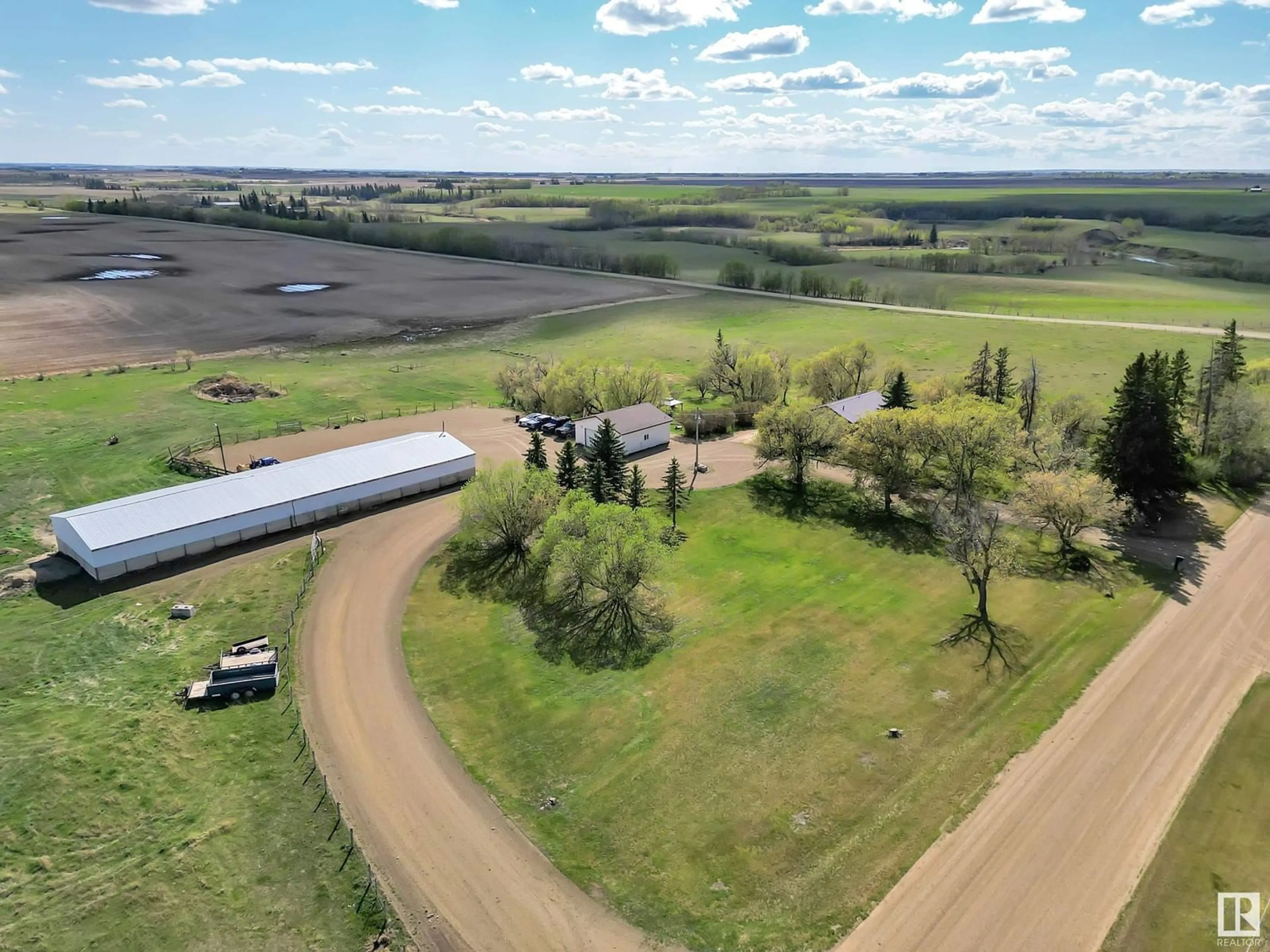 A pic from outside/outdoor area/front of a property/back of a property/a pic from drone, building for 225075 TWP ROAD 454, Rural Wetaskiwin County Alberta T9A1W9