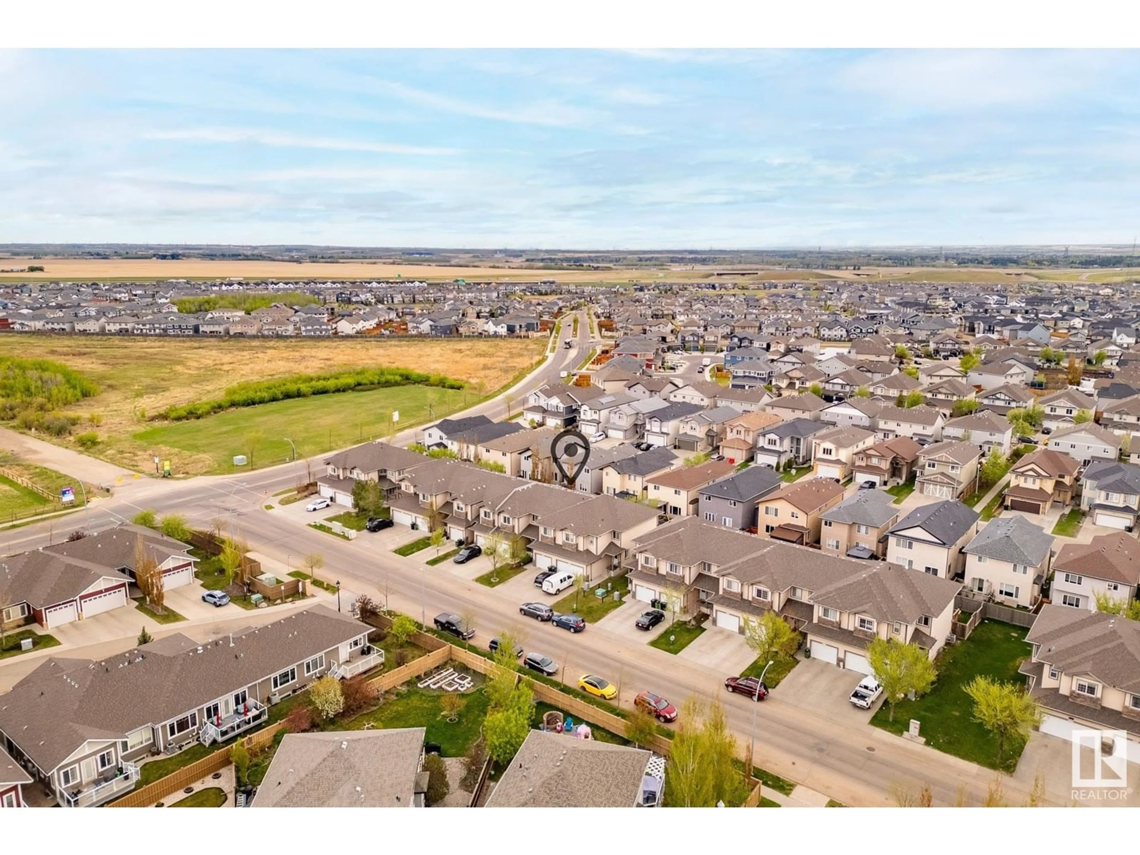 A pic from outside/outdoor area/front of a property/back of a property/a pic from drone, street for NW - 16905 55 ST, Edmonton Alberta T5Y0R2
