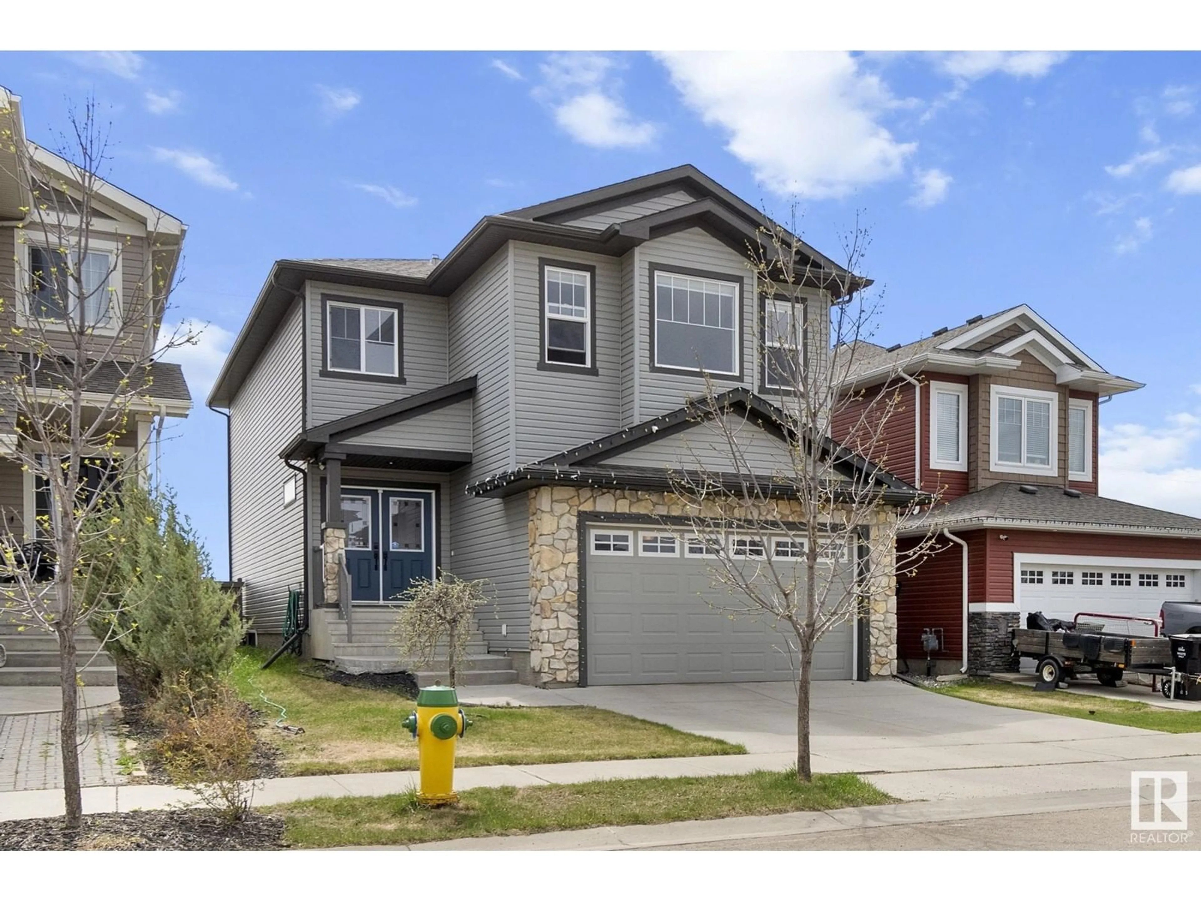 Home with vinyl exterior material, street for 3 SANDALWOOD PL, Leduc Alberta T9E1C2