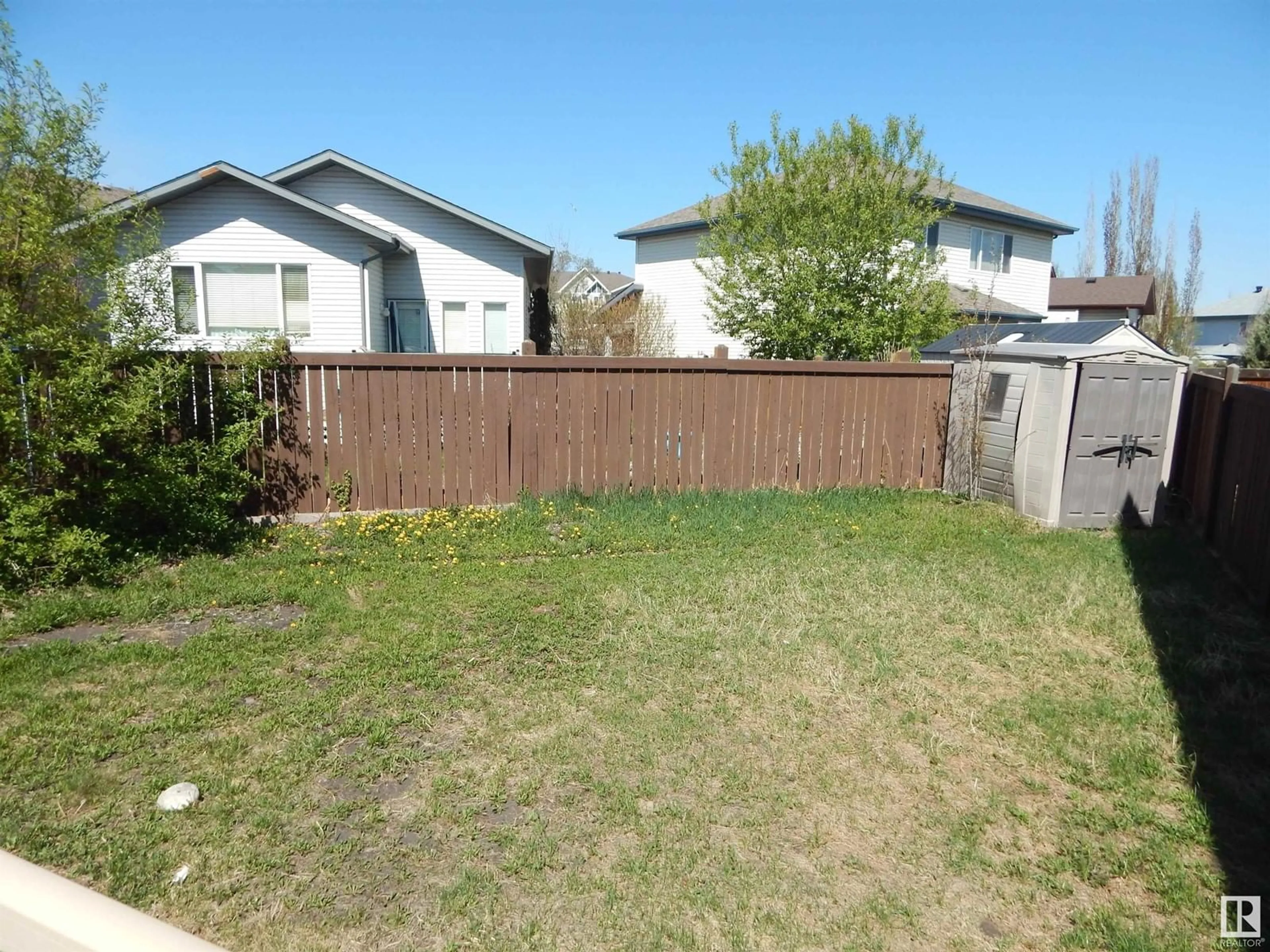A pic from outside/outdoor area/front of a property/back of a property/a pic from drone, street for 11147 157 AV, Edmonton Alberta T5X4V1