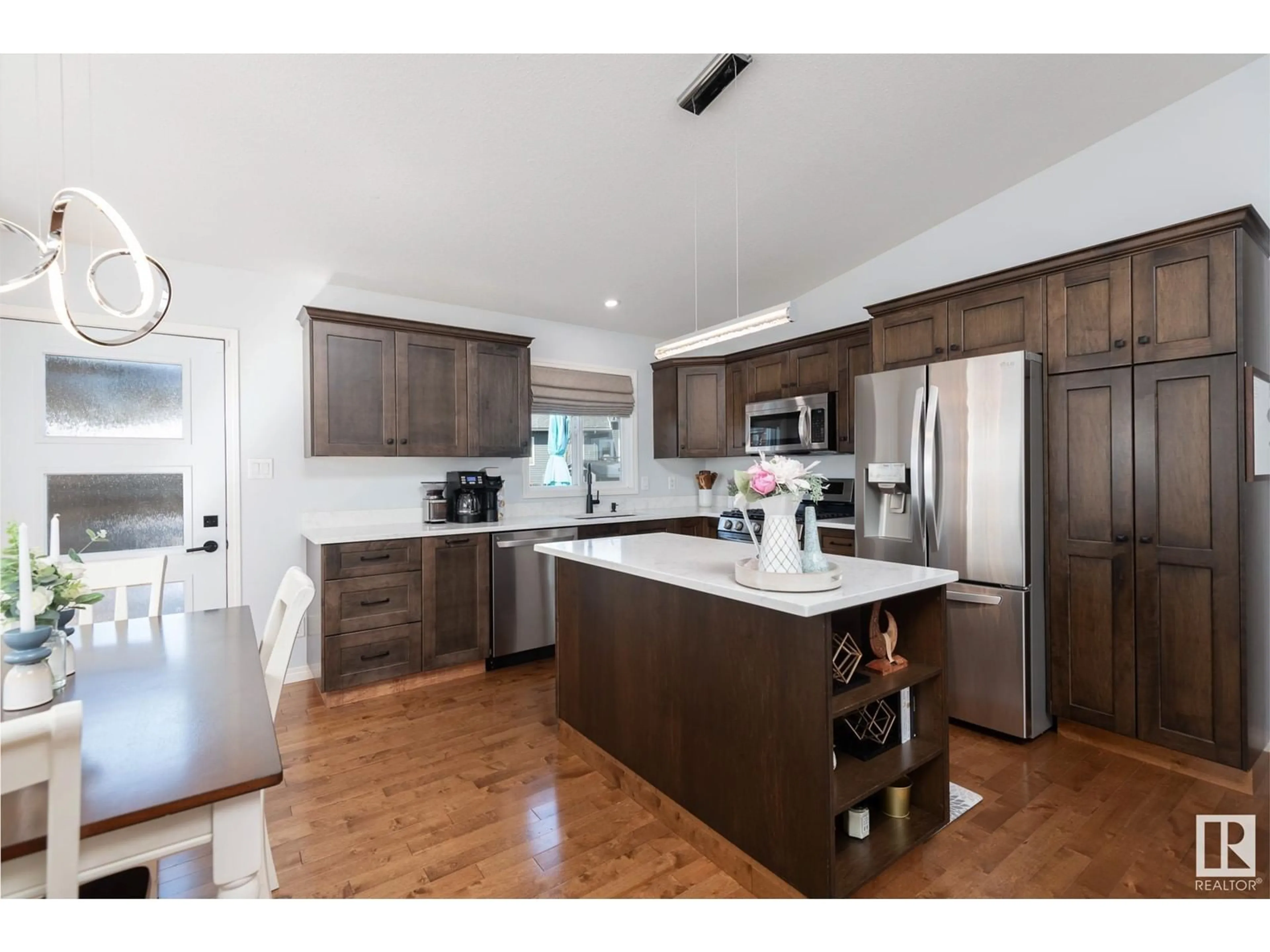 Open concept kitchen, wood/laminate floor for 1508 14 AV, Cold Lake Alberta T9M1Z8