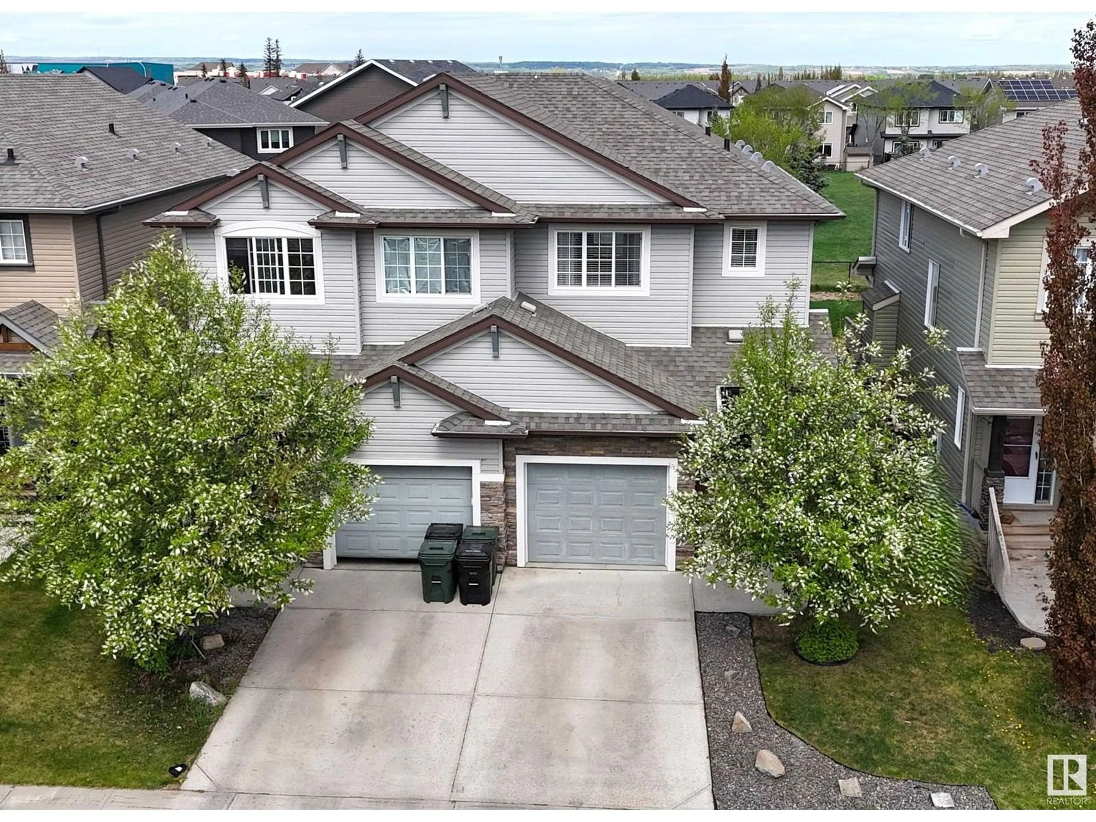 A pic from outside/outdoor area/front of a property/back of a property/a pic from drone, street for 7 MEADOWVIEW CO, Spruce Grove Alberta T7X0N2