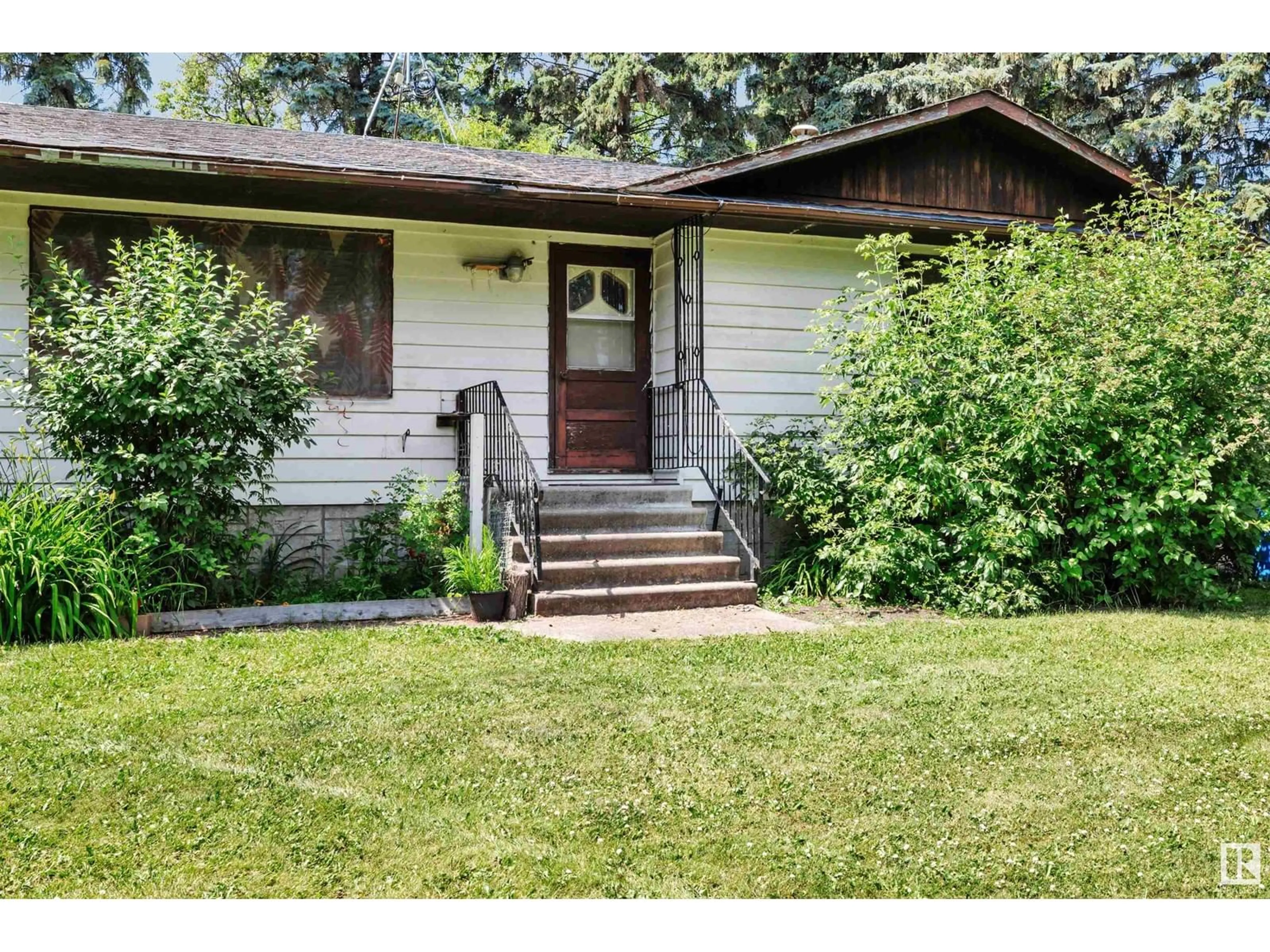 Home with vinyl exterior material, street for 57020 SH 803, Rural Sturgeon County Alberta T0A0K1