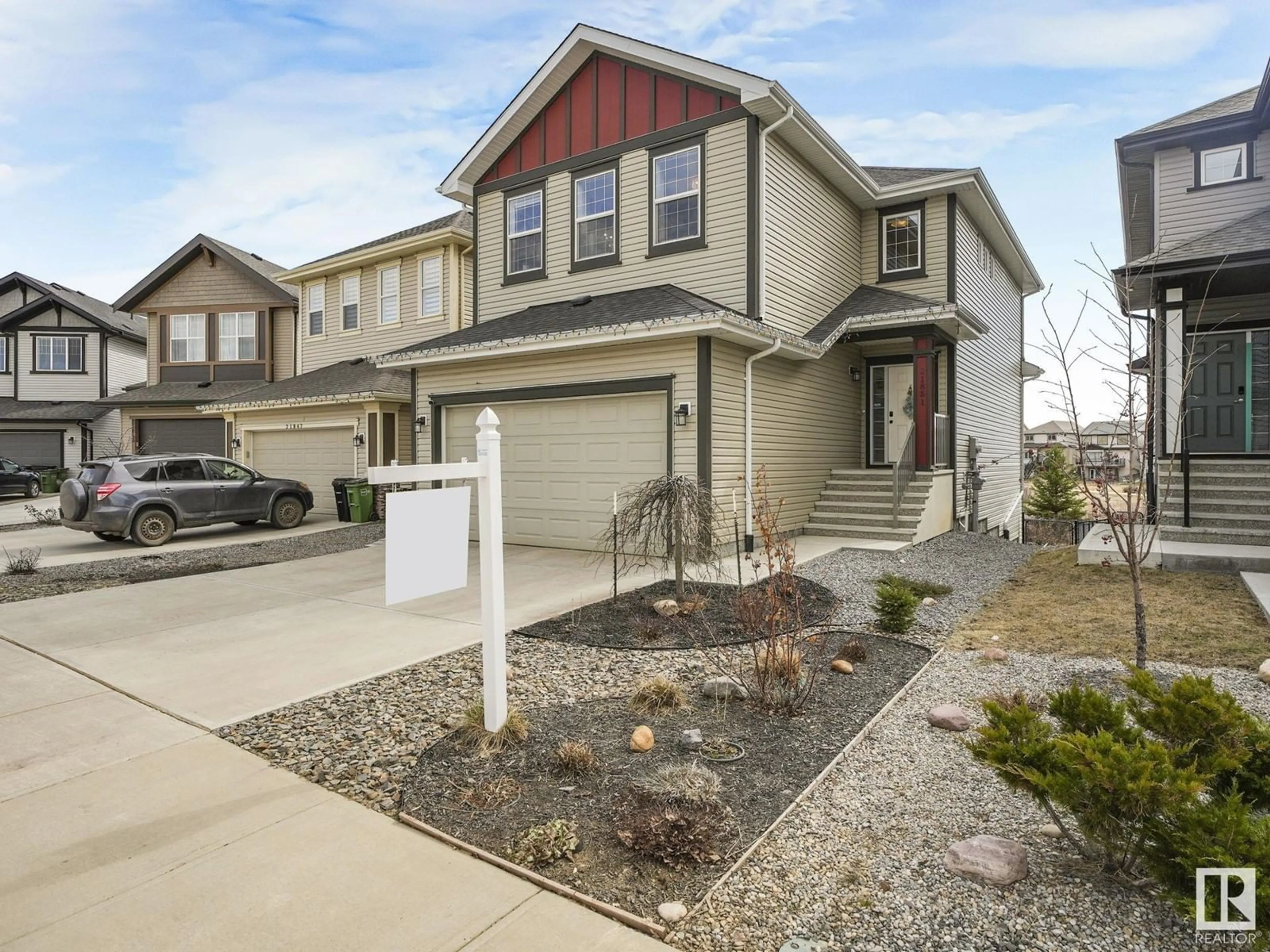 Home with vinyl exterior material, street for 21851 98 AV, Edmonton Alberta T5T7J3