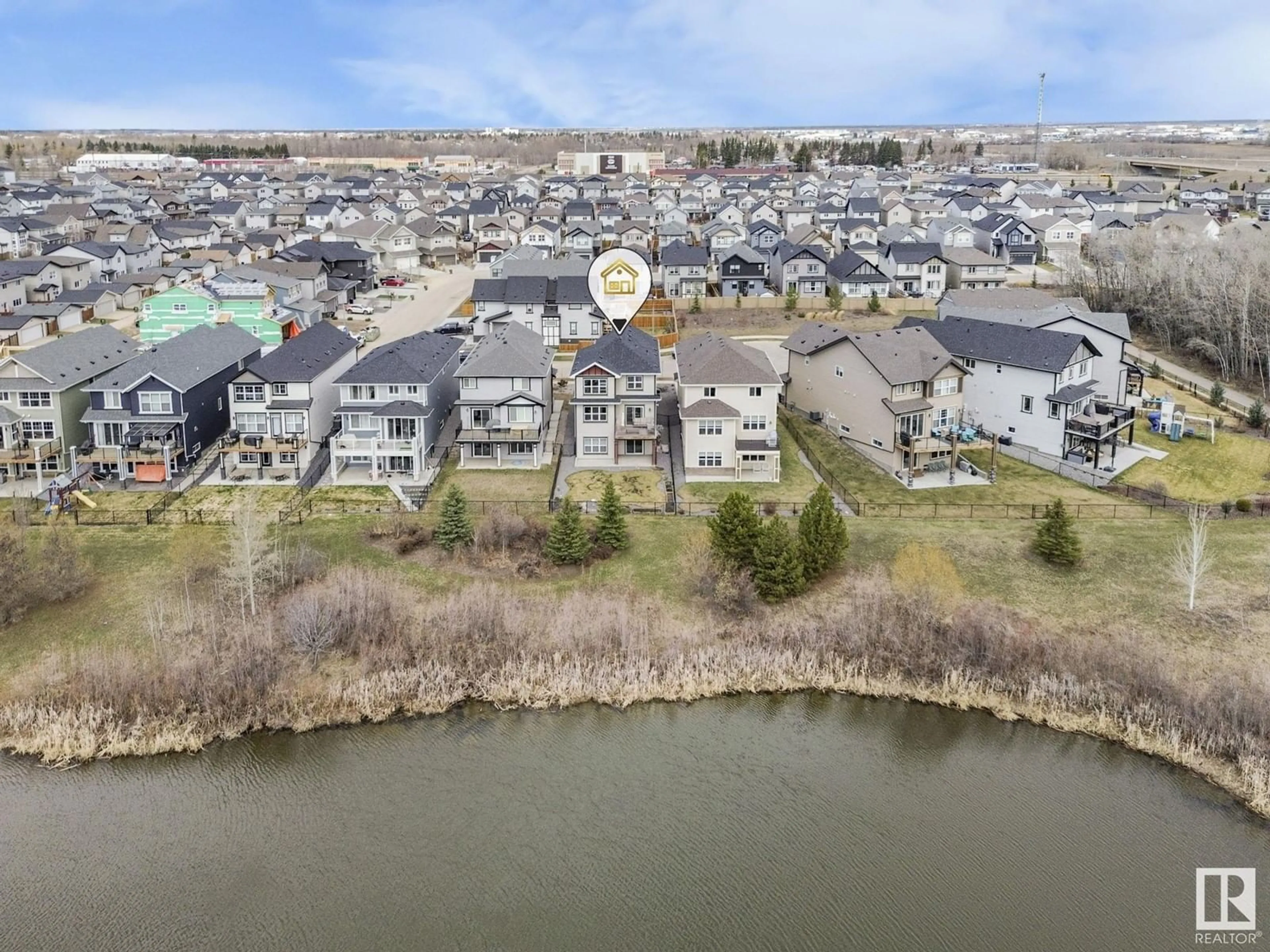 A pic from outside/outdoor area/front of a property/back of a property/a pic from drone, water/lake/river/ocean view for 21851 98 AV, Edmonton Alberta T5T7J3