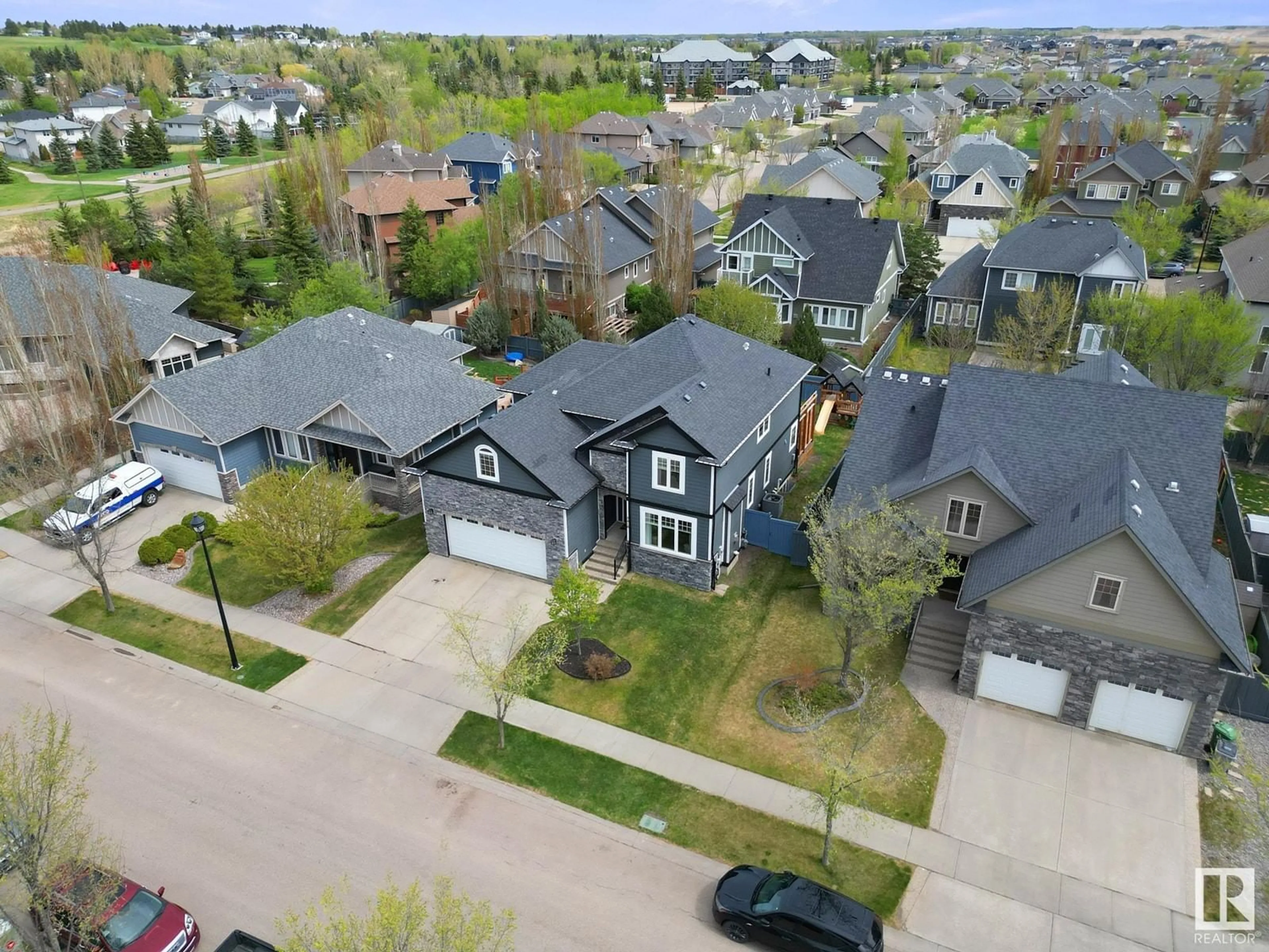 A pic from outside/outdoor area/front of a property/back of a property/a pic from drone, street for 5418 BAIE CAILLOU BA, Beaumont Alberta T4X1W7