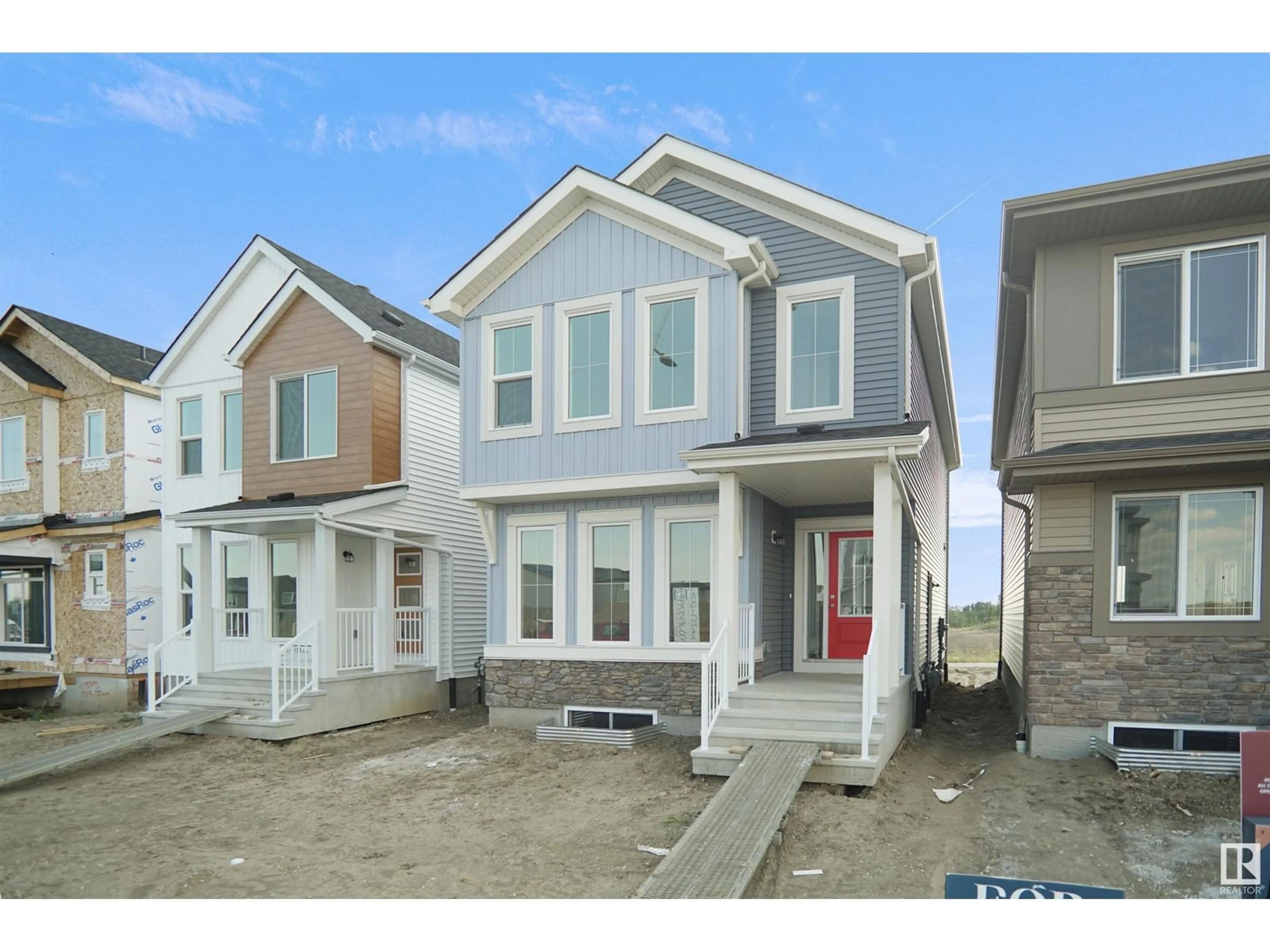 Home with vinyl exterior material, street for NE - 17318 6A ST, Edmonton Alberta T5Y4E8