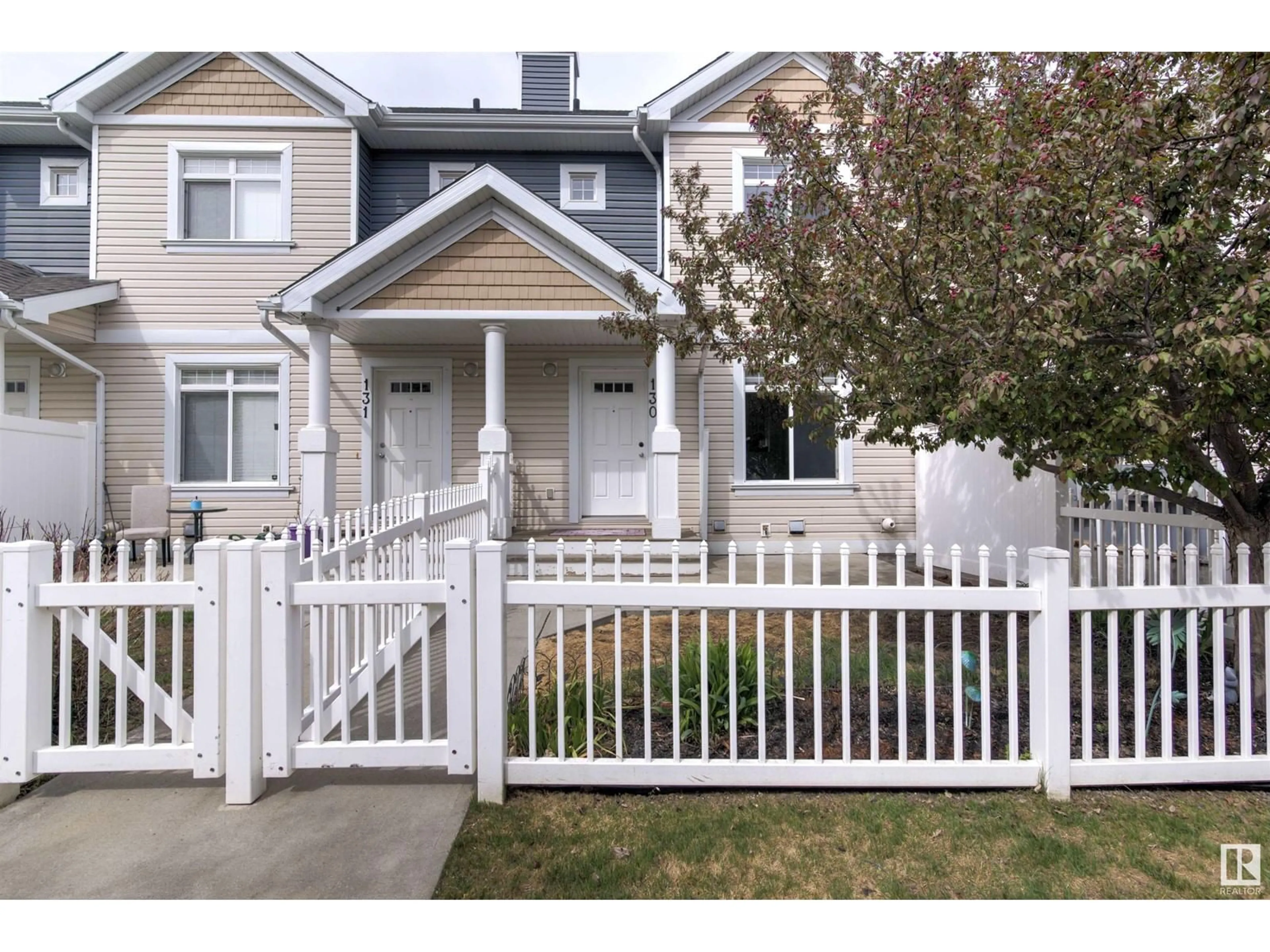 Home with vinyl exterior material, street for #130 - 1804 70 ST, Edmonton Alberta T6X0H4