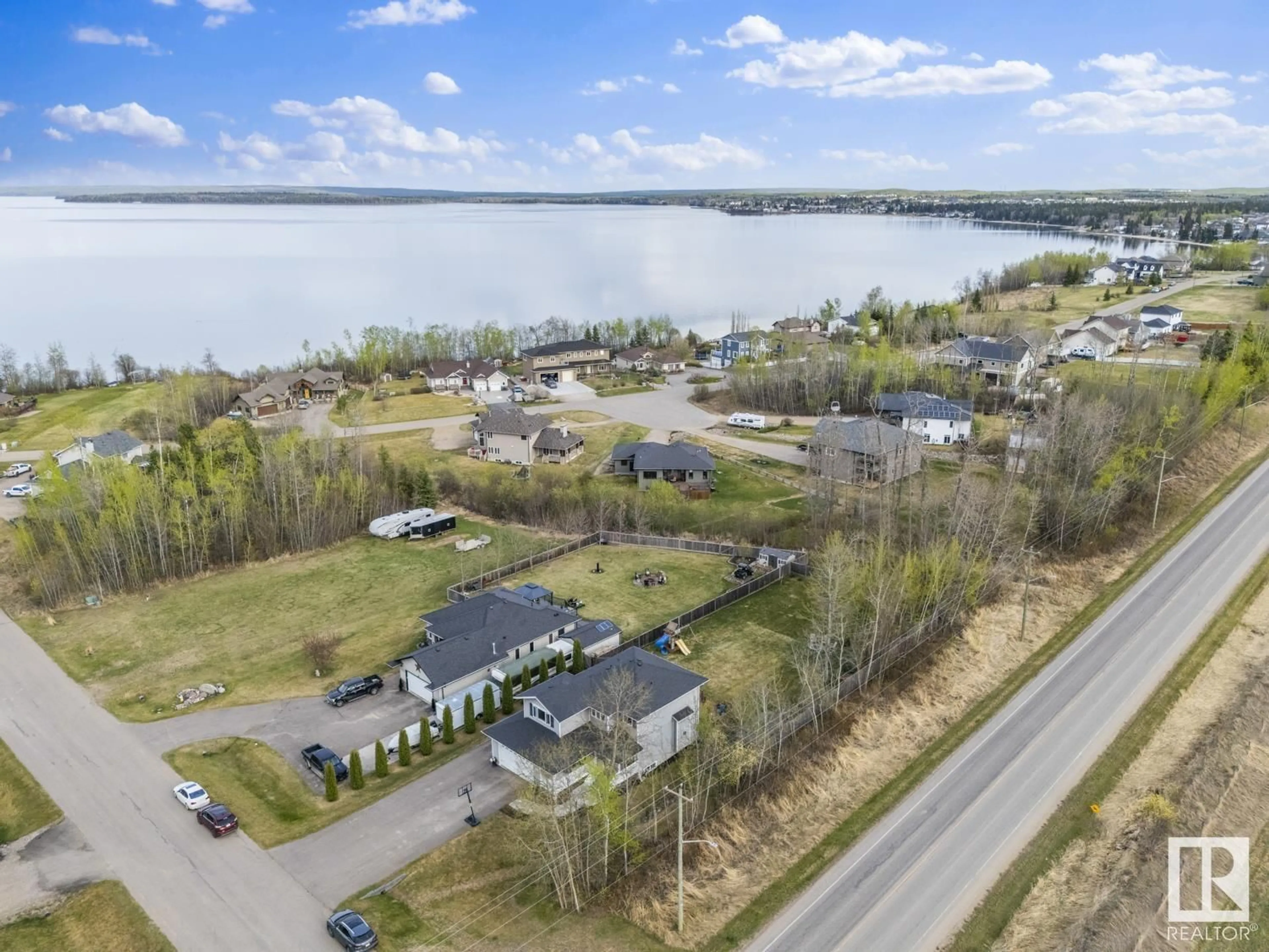 A pic from outside/outdoor area/front of a property/back of a property/a pic from drone, water/lake/river/ocean view for 2718 HORSESHOE BAY ES, Cold Lake Alberta T9M1G9