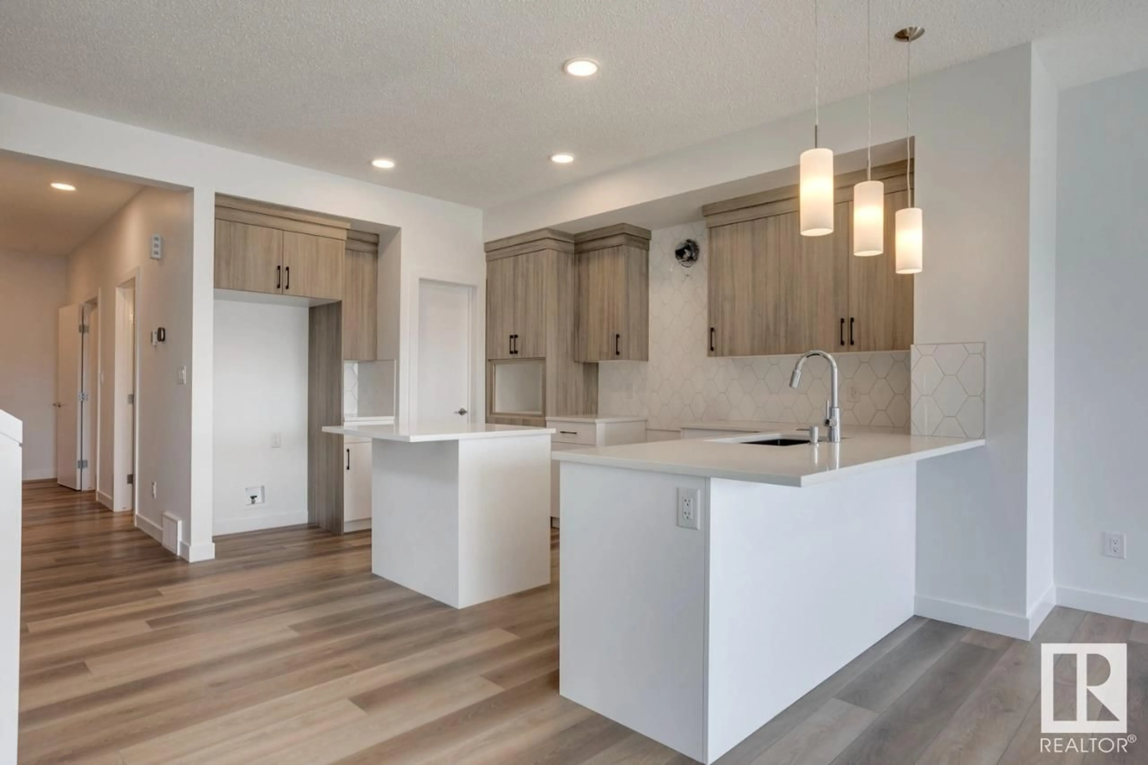 Open concept kitchen, unknown for 19019 20 AV, Edmonton Alberta T6M3E8