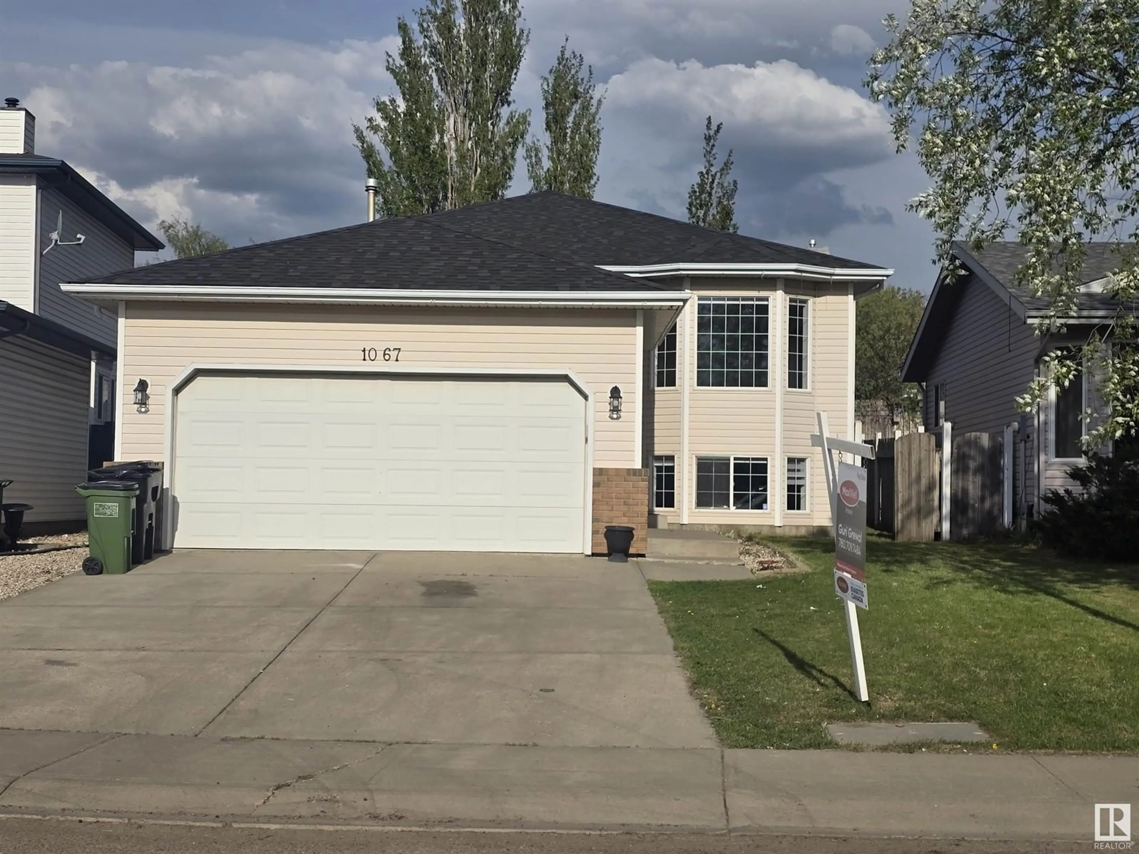 Home with vinyl exterior material, street for 1067 JONES CR, Edmonton Alberta T6L6Y1