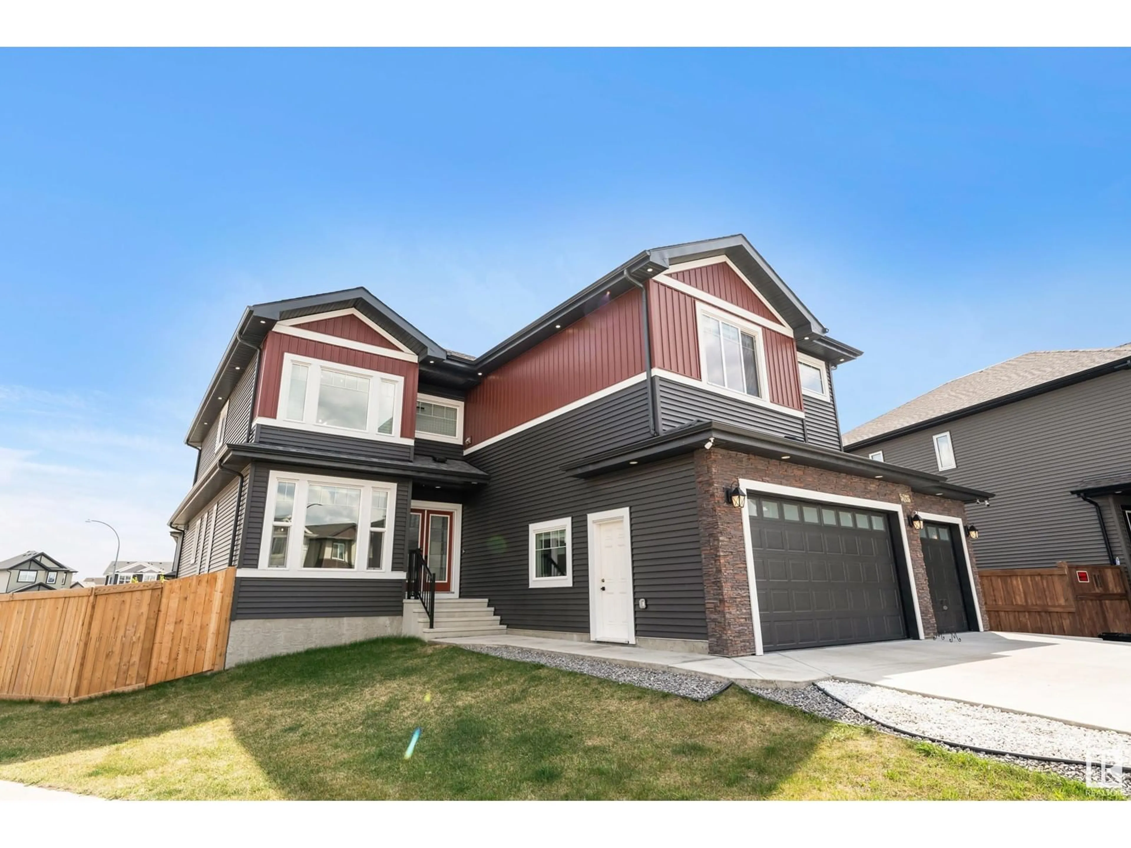 Home with vinyl exterior material, street for NW - 5703 176 AV, Edmonton Alberta T5Y3V6