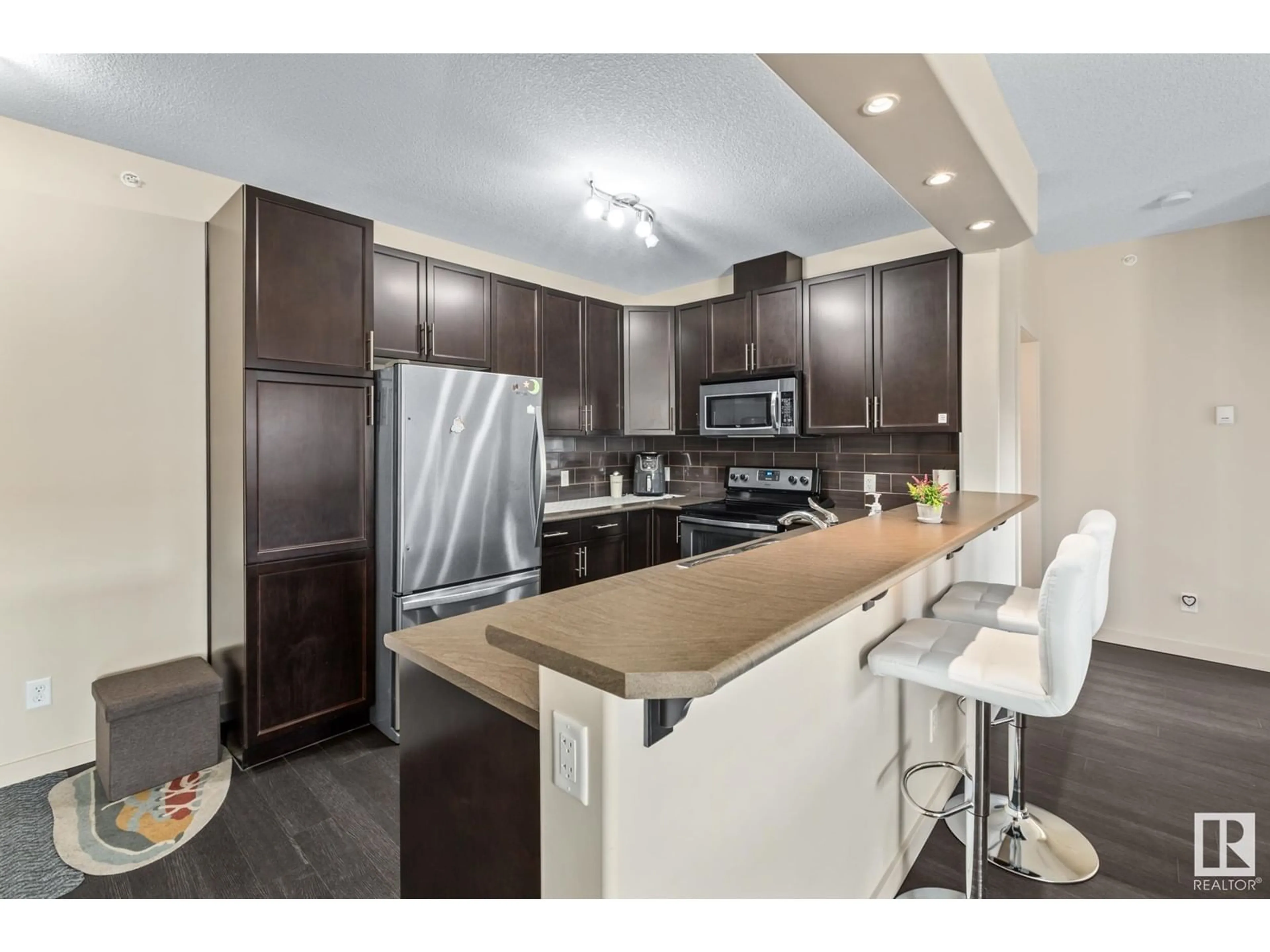 Open concept kitchen, unknown for #457 - 11517 ELLERSLIE RD, Edmonton Alberta T6W2A9