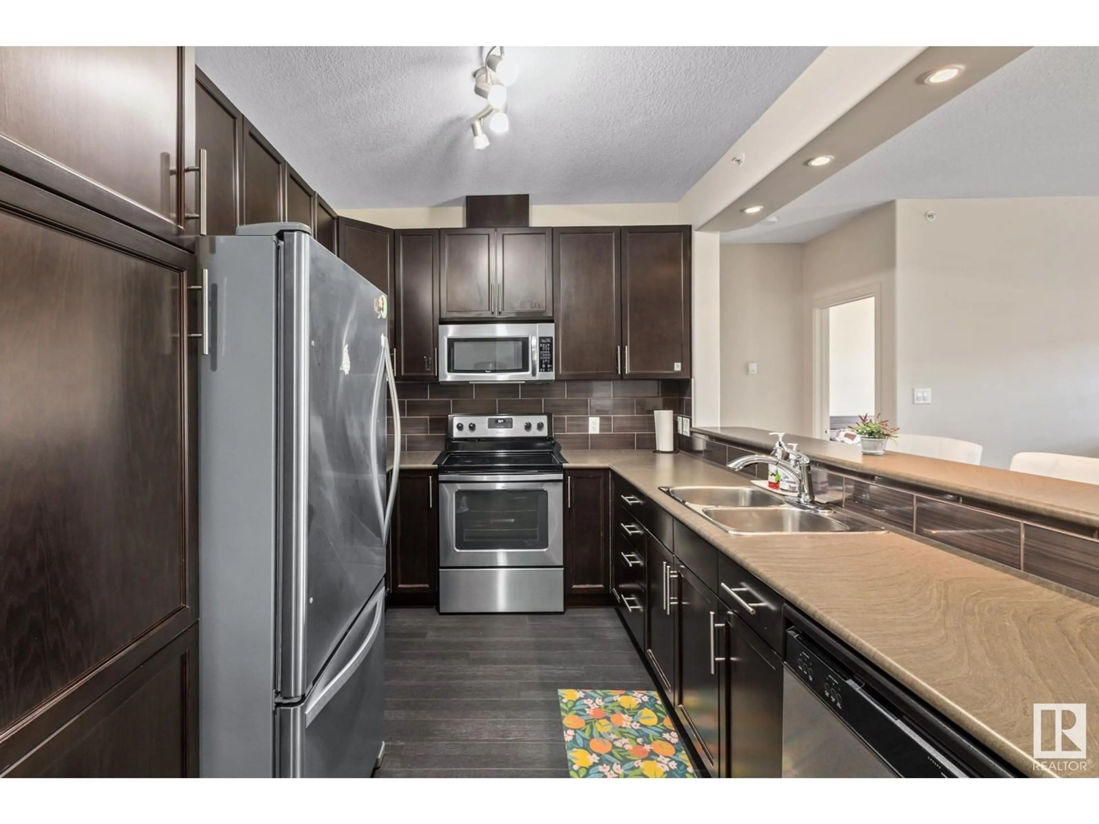 Open concept kitchen, unknown for #457 - 11517 ELLERSLIE RD, Edmonton Alberta T6W2A9
