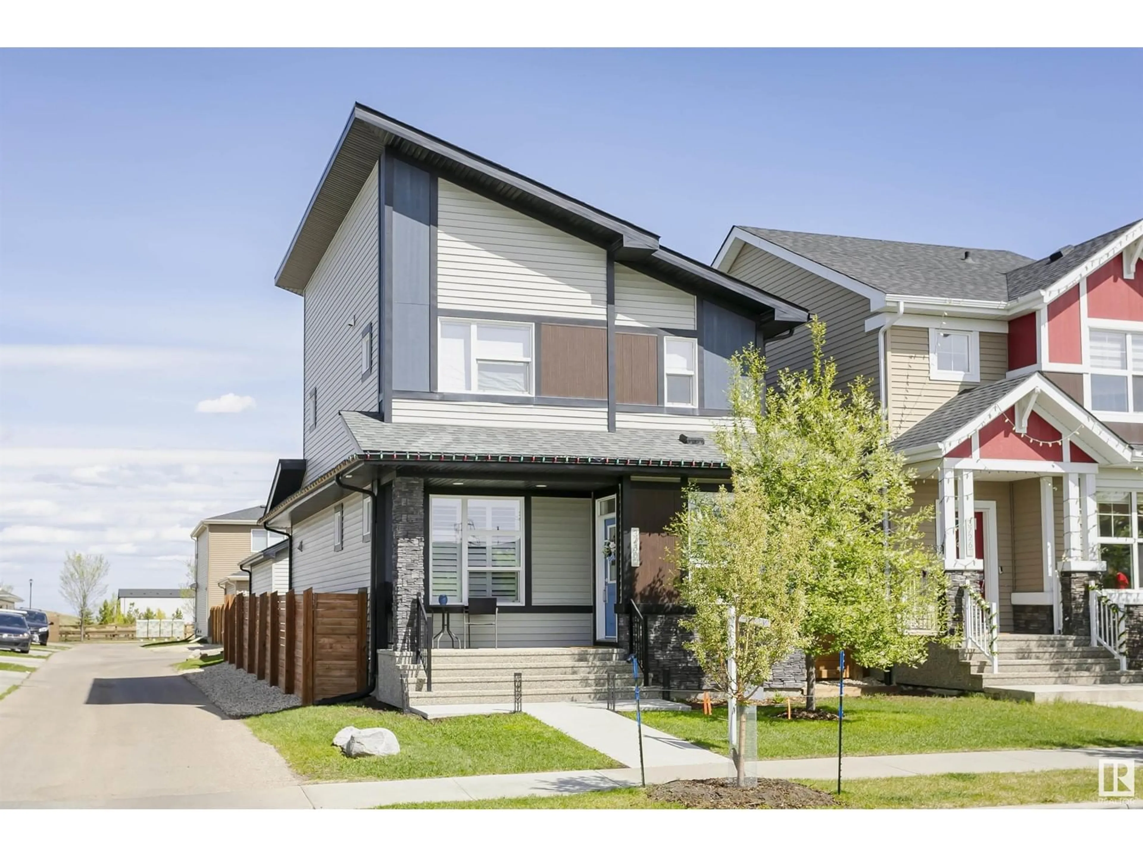 Home with vinyl exterior material, street for 3730 8 AV, Edmonton Alberta T6X2G6