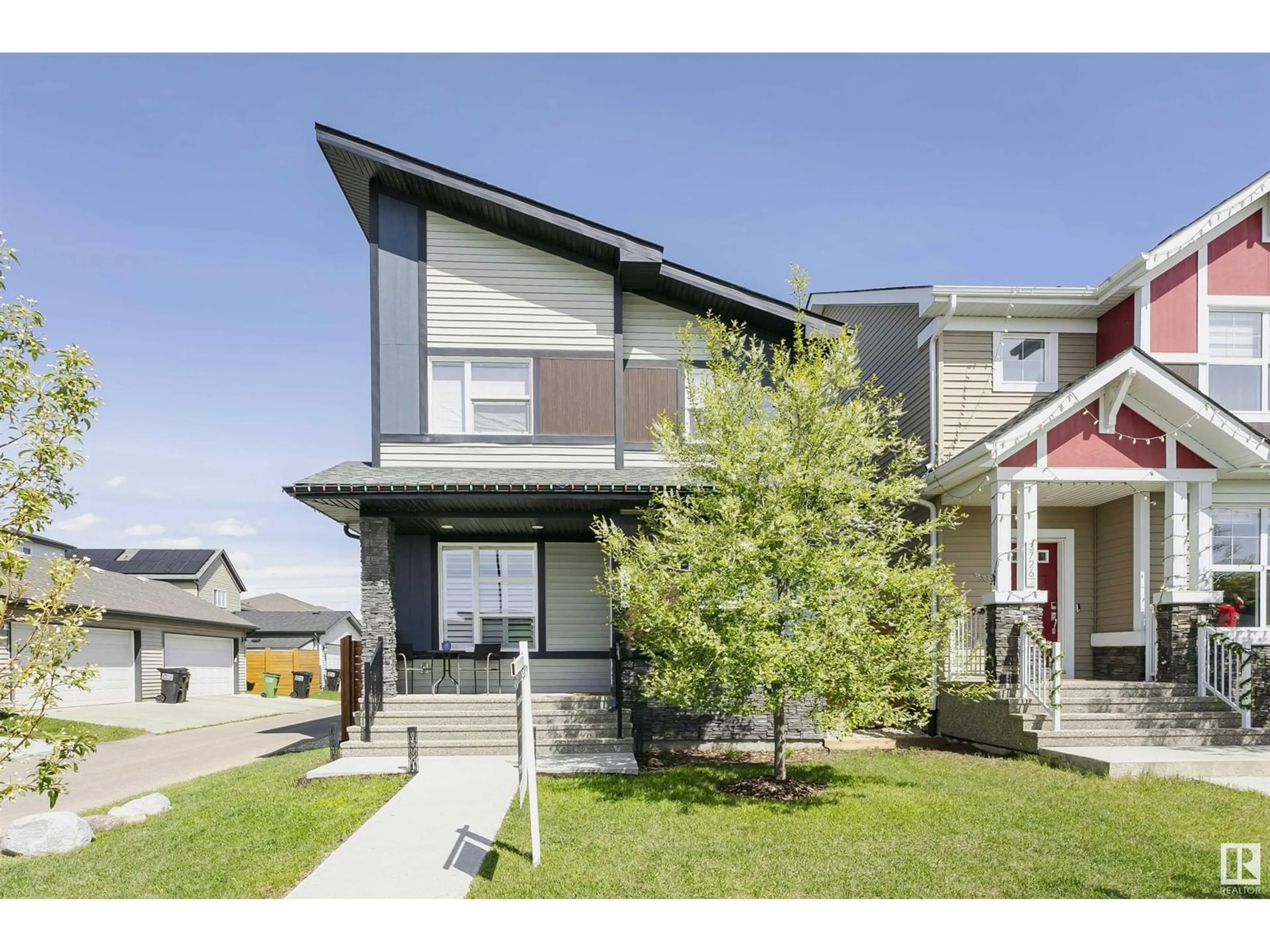 Home with vinyl exterior material, street for 3730 8 AV, Edmonton Alberta T6X2G6