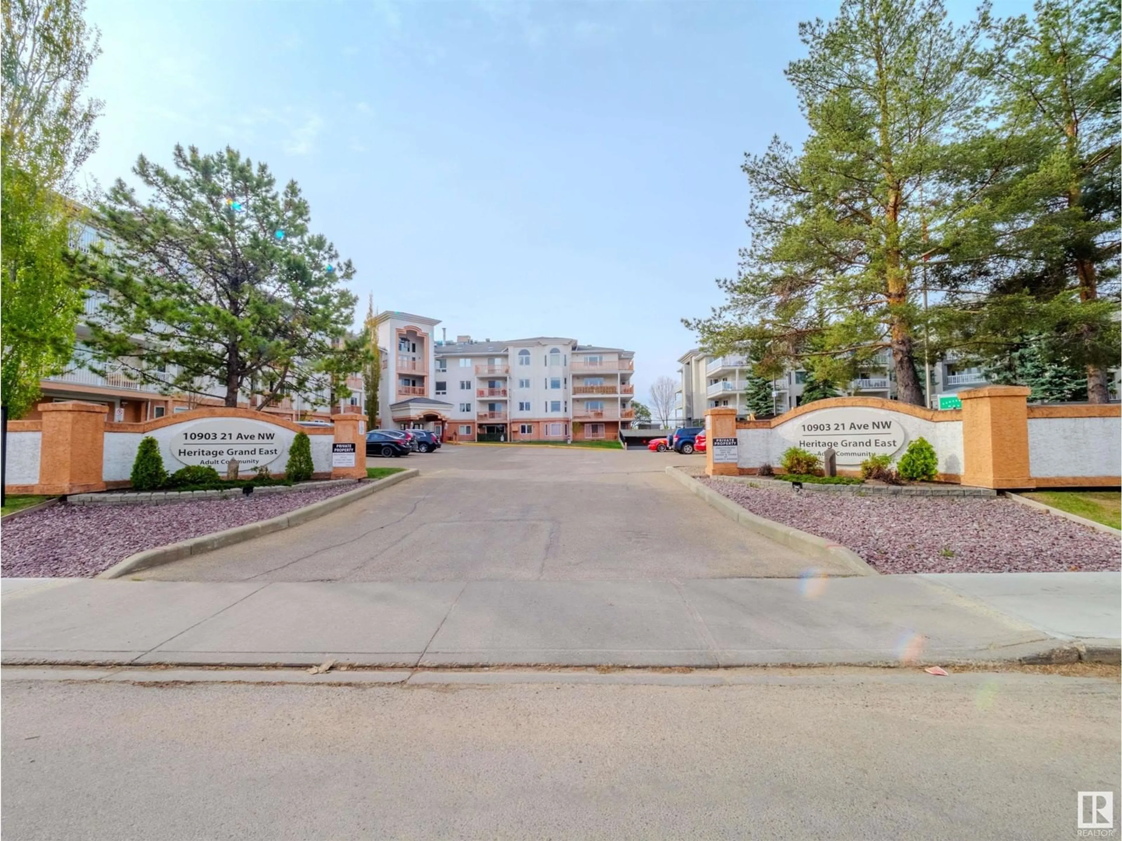 A pic from outside/outdoor area/front of a property/back of a property/a pic from drone, street for #306 - 10903 21 AV, Edmonton Alberta T6J7A4