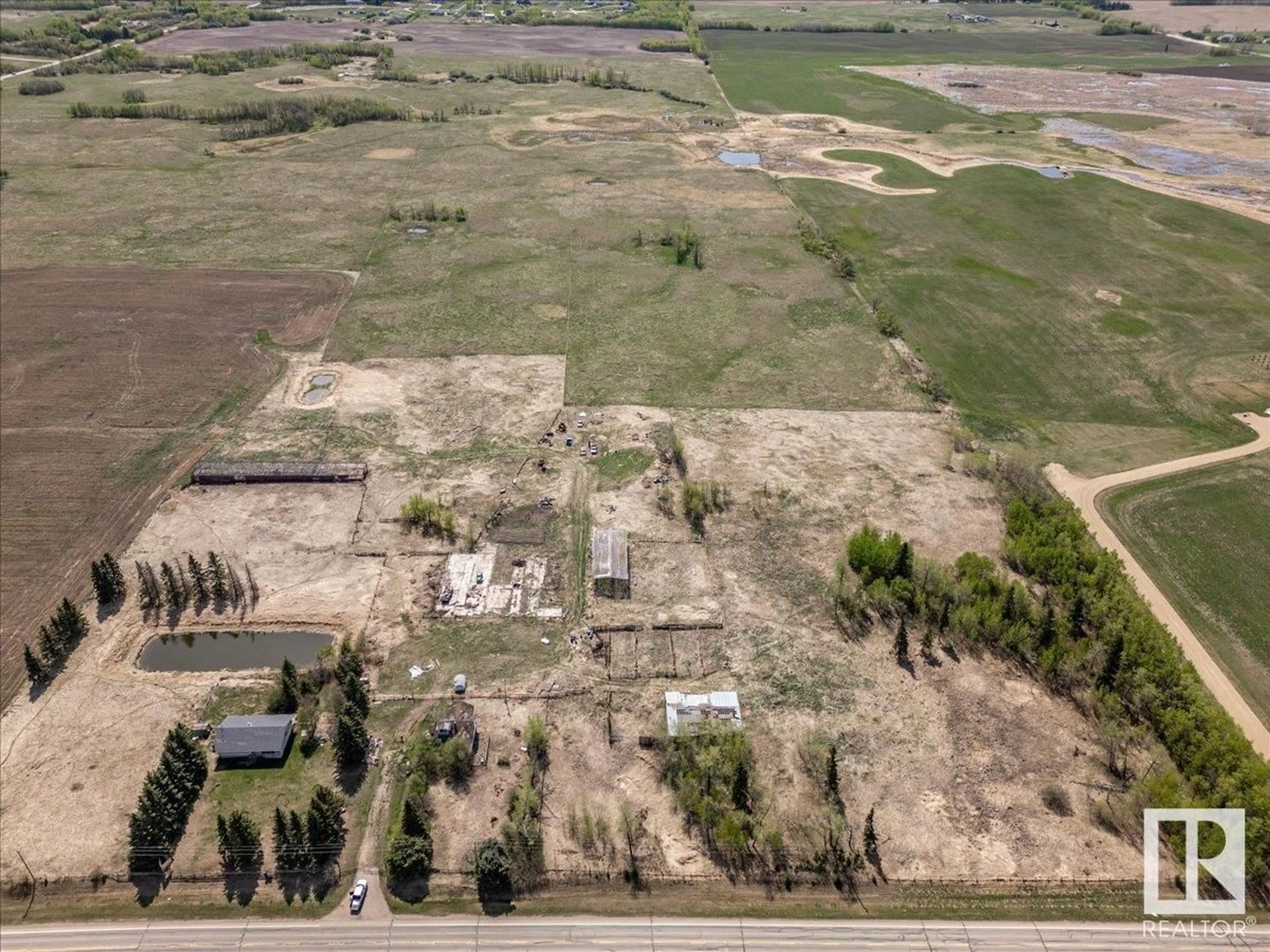 A pic from outside/outdoor area/front of a property/back of a property/a pic from drone, building for 23331 TWP ROAD 502, Rural Leduc County Alberta T4X0R4