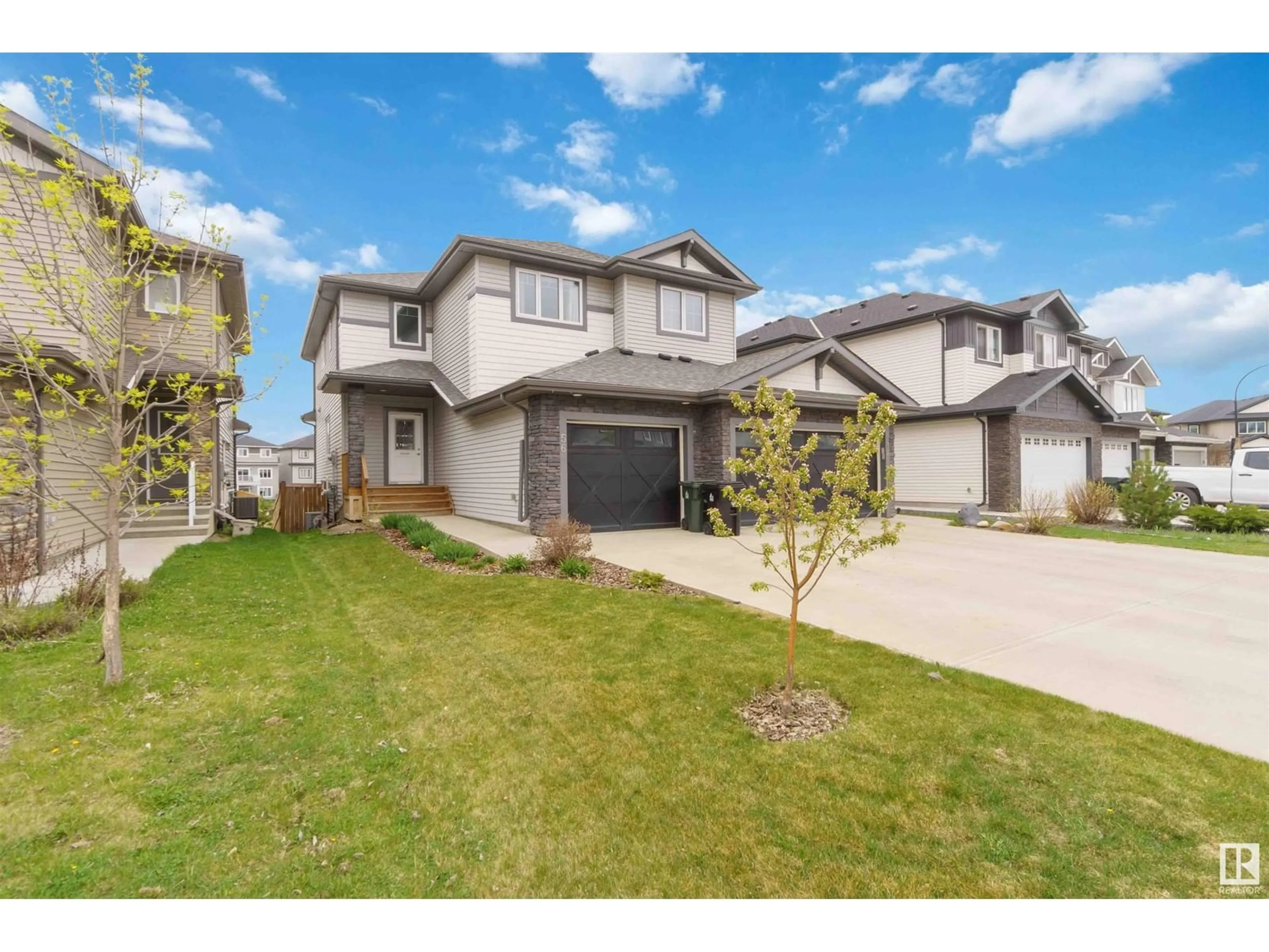 A pic from outside/outdoor area/front of a property/back of a property/a pic from drone, street for 56 AVERY COVE, Spruce Grove Alberta T7X0X8