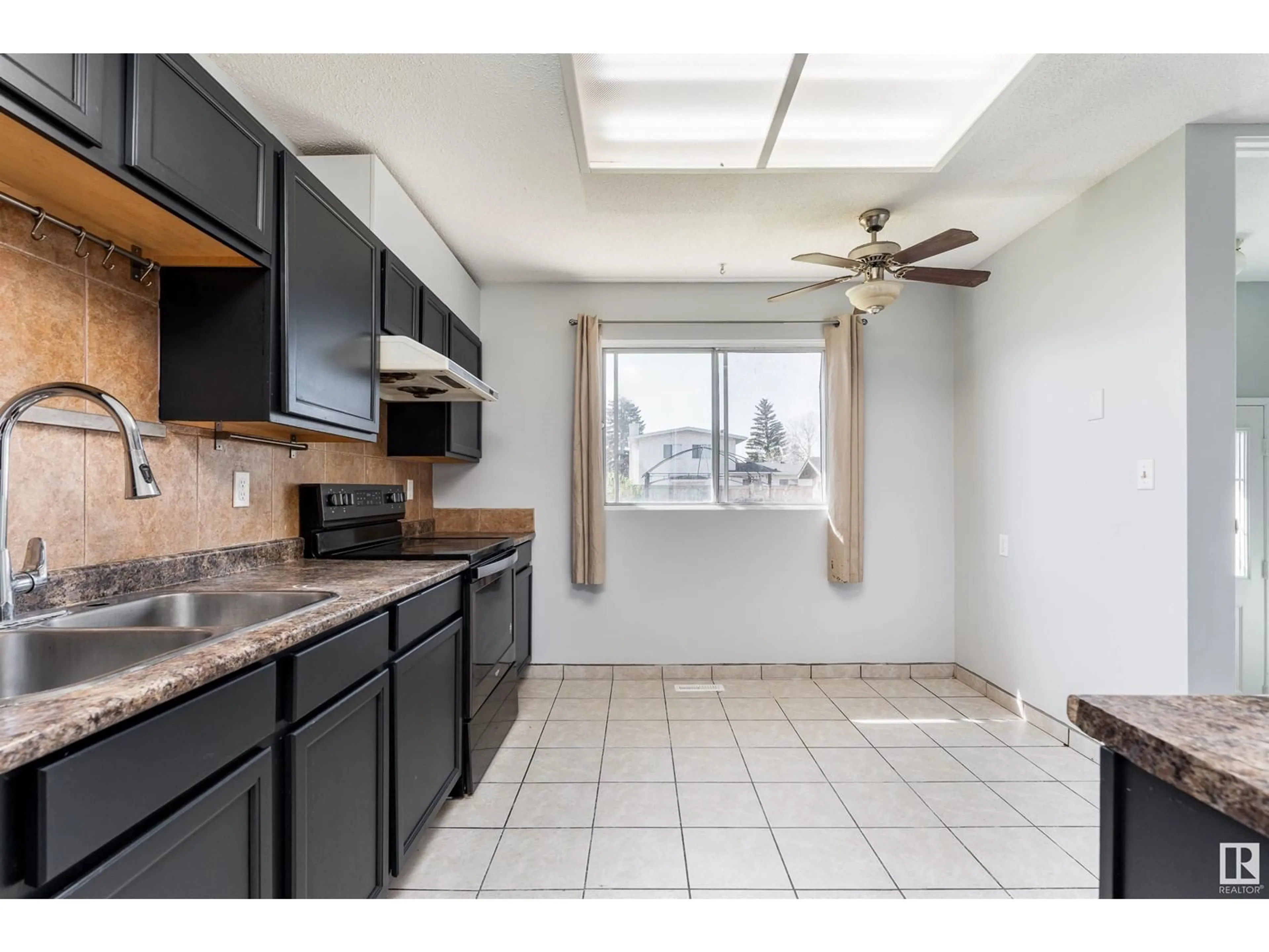 Standard kitchen, ceramic/tile floor for 9915 170 AV, Edmonton Alberta T5X3G3