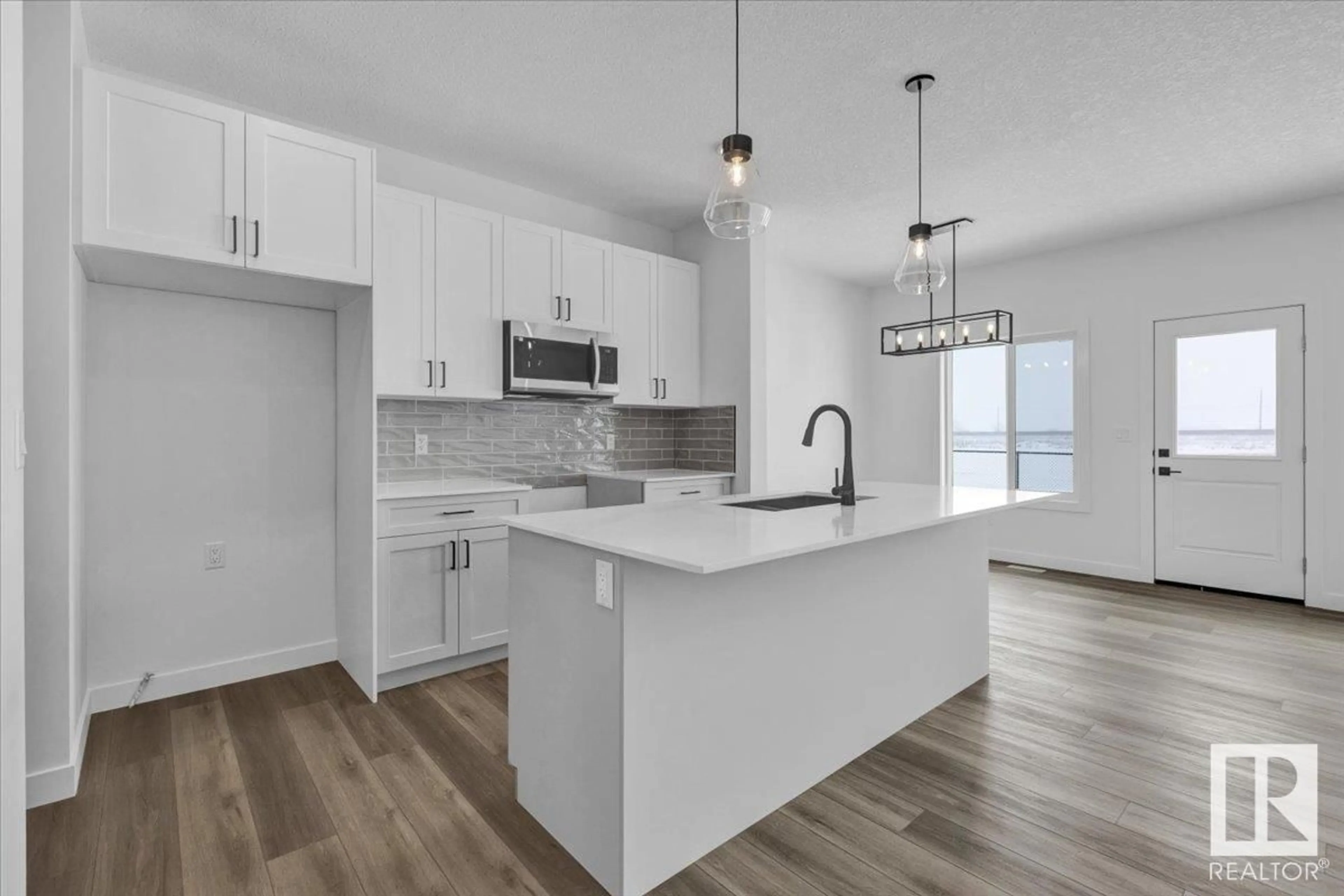 Open concept kitchen, unknown for 9213 102 ST, Morinville Alberta T8R2R4