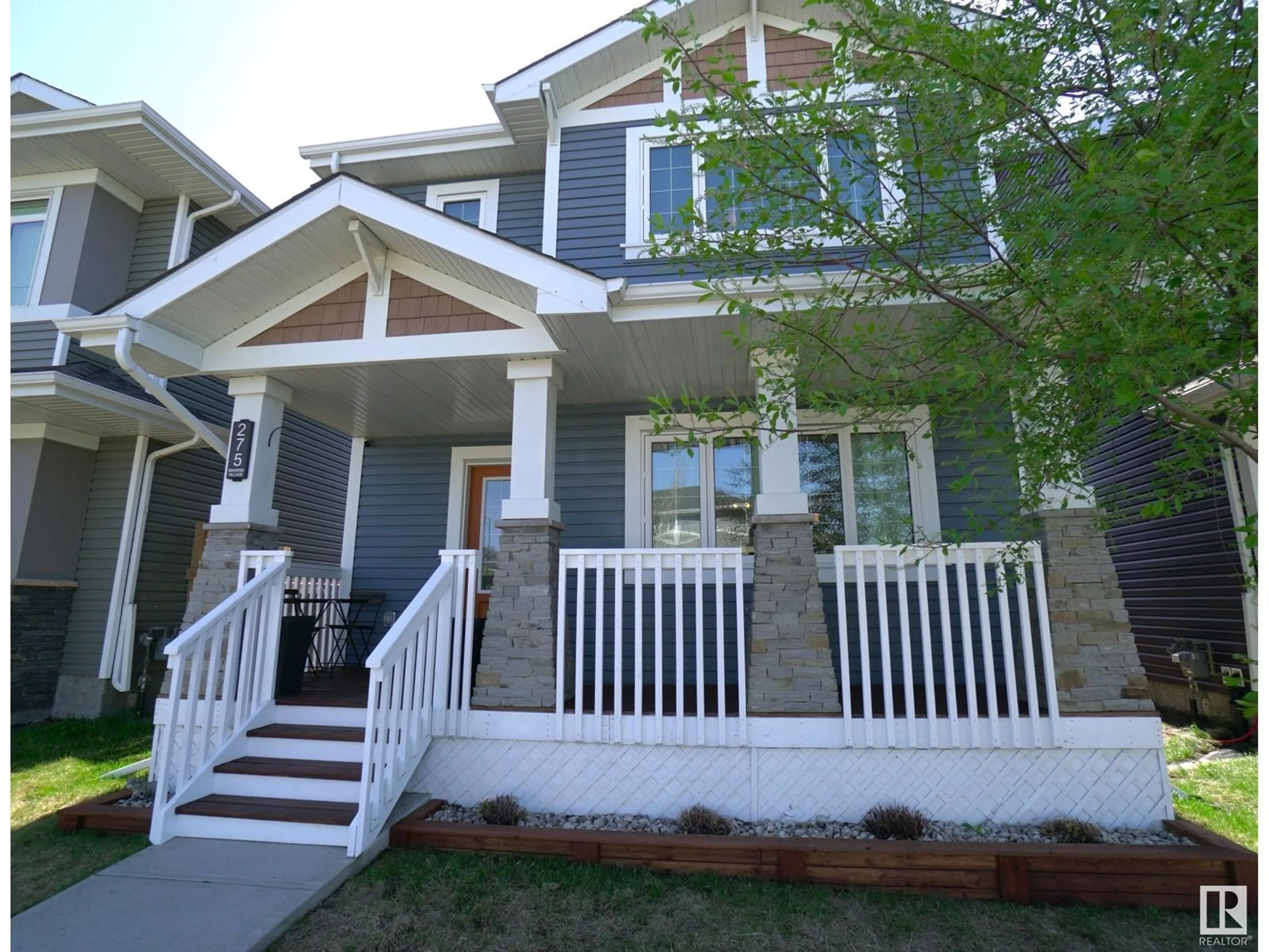 Home with vinyl exterior material, street for 275 EBBERS BV, Edmonton Alberta T5Y3B2