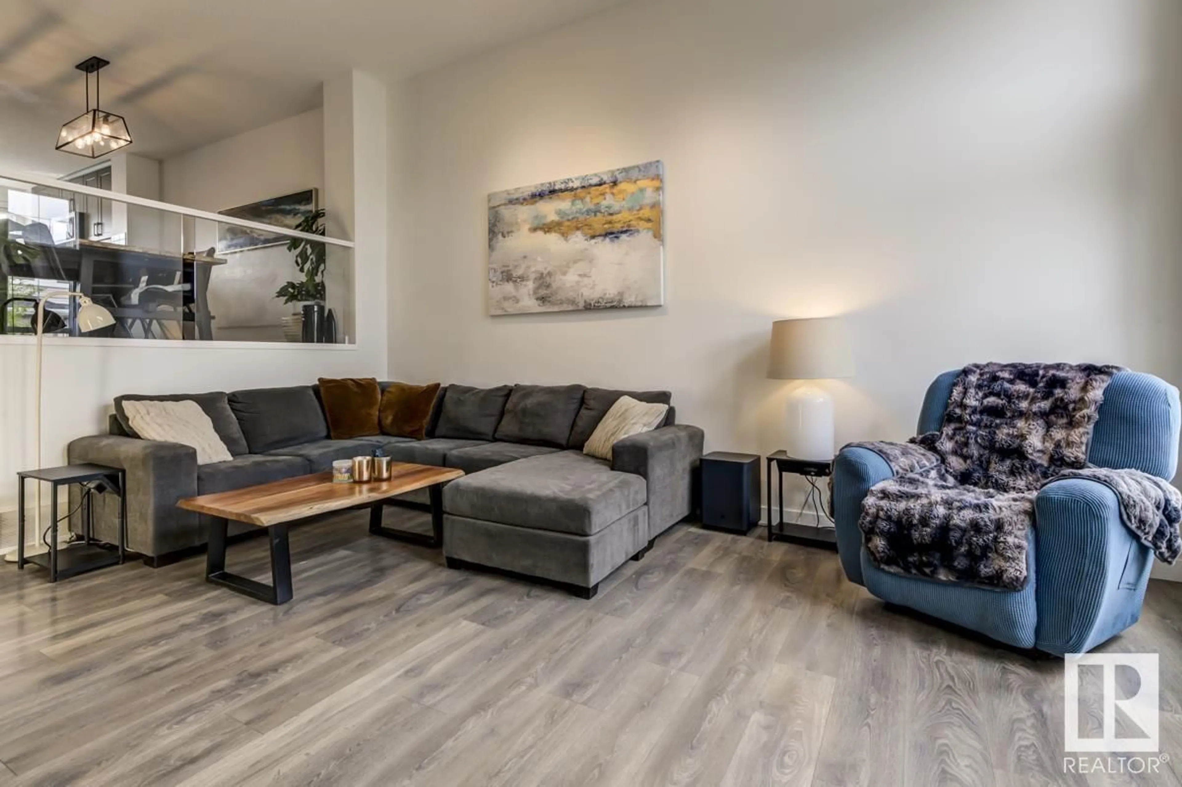 Living room with furniture, wood/laminate floor for SW - 2813 ANTON WD, Edmonton Alberta T6W4B1