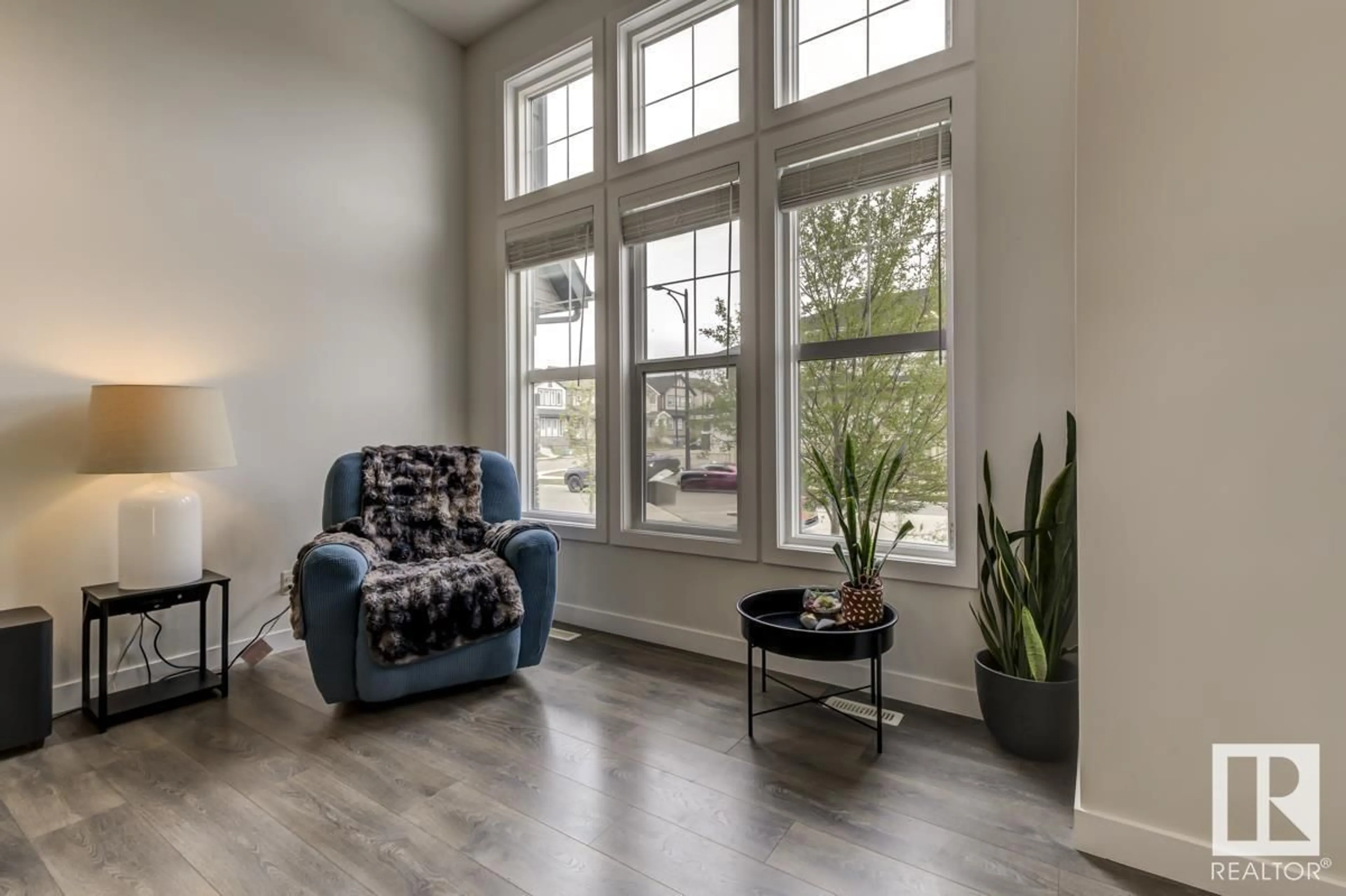 Living room with furniture, wood/laminate floor for SW - 2813 ANTON WD, Edmonton Alberta T6W4B1