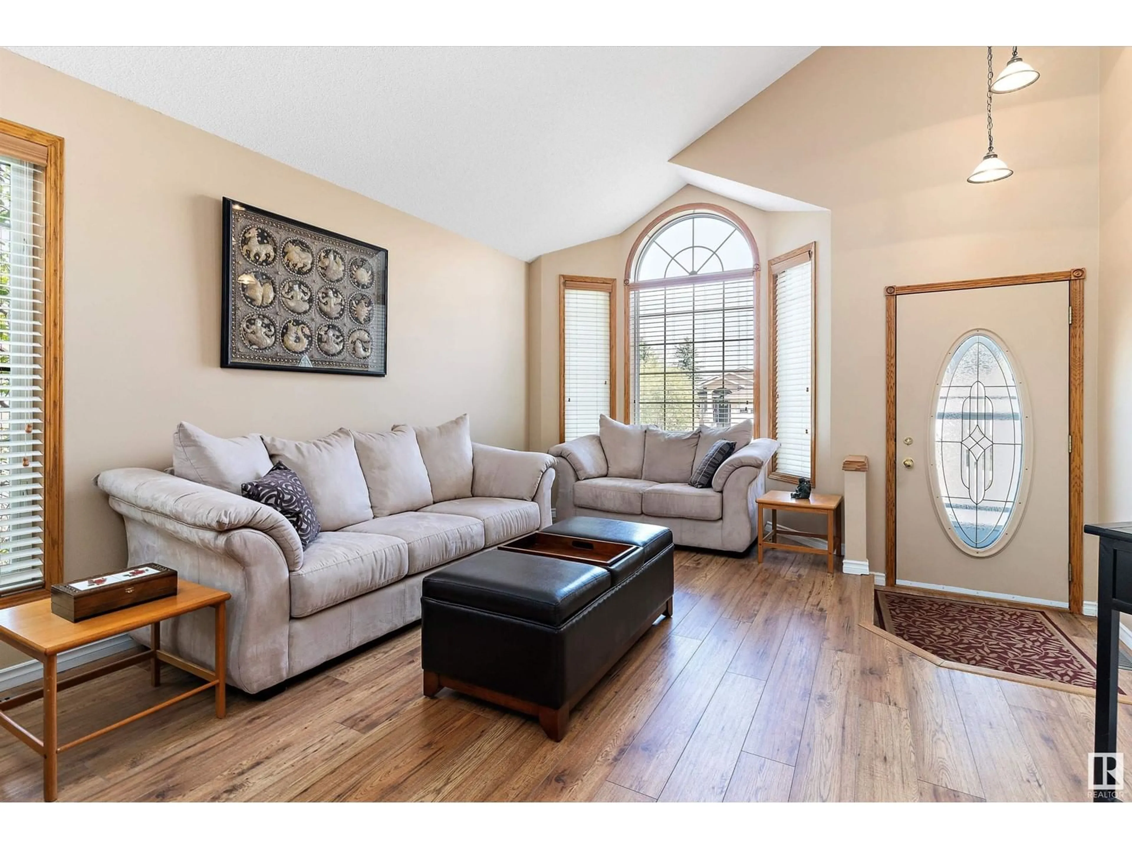 Living room with furniture, wood/laminate floor for 409 MEADOWVIEW TC, Sherwood Park Alberta T8H1X7