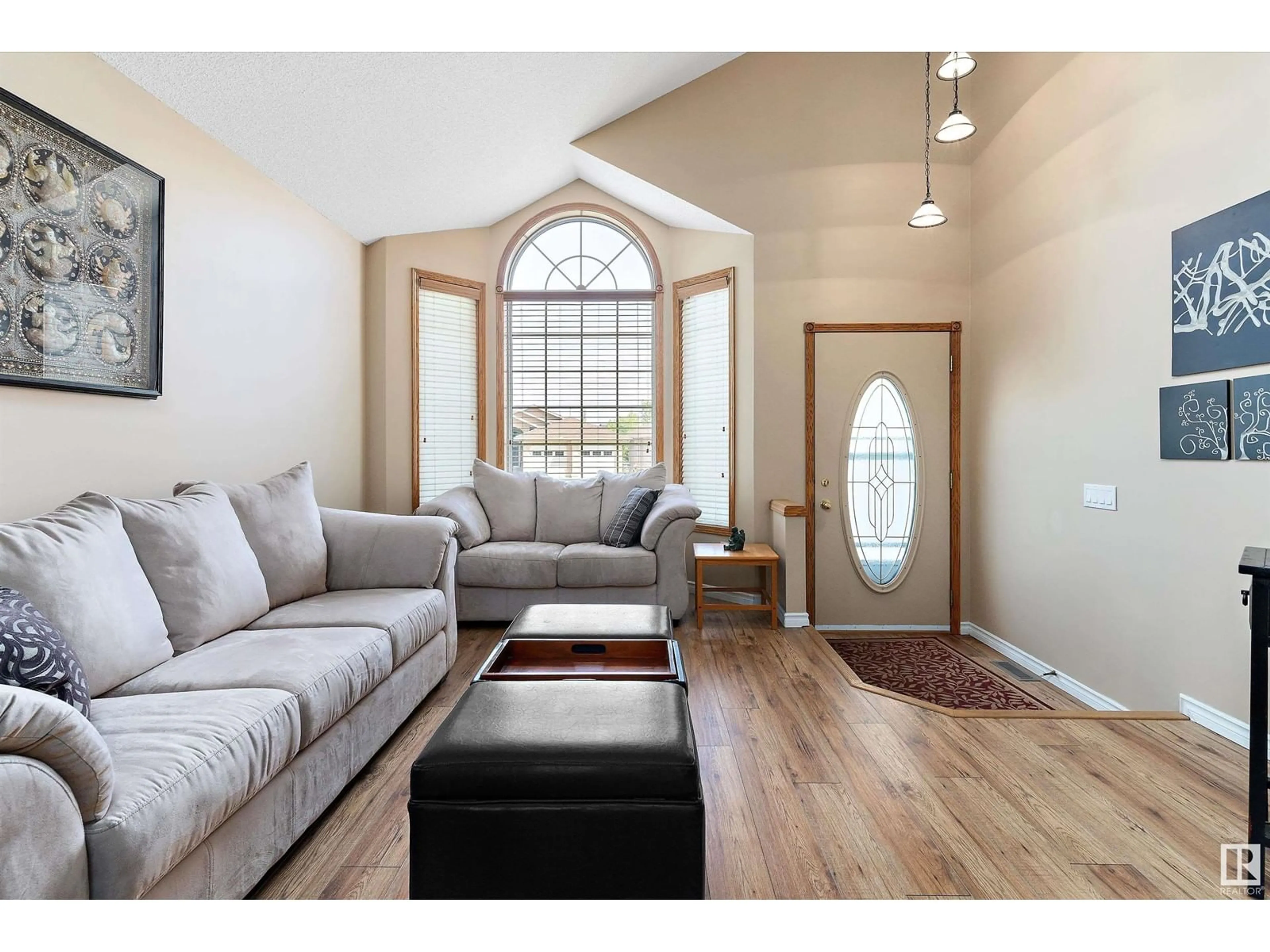 Living room with furniture, wood/laminate floor for 409 MEADOWVIEW TC, Sherwood Park Alberta T8H1X7