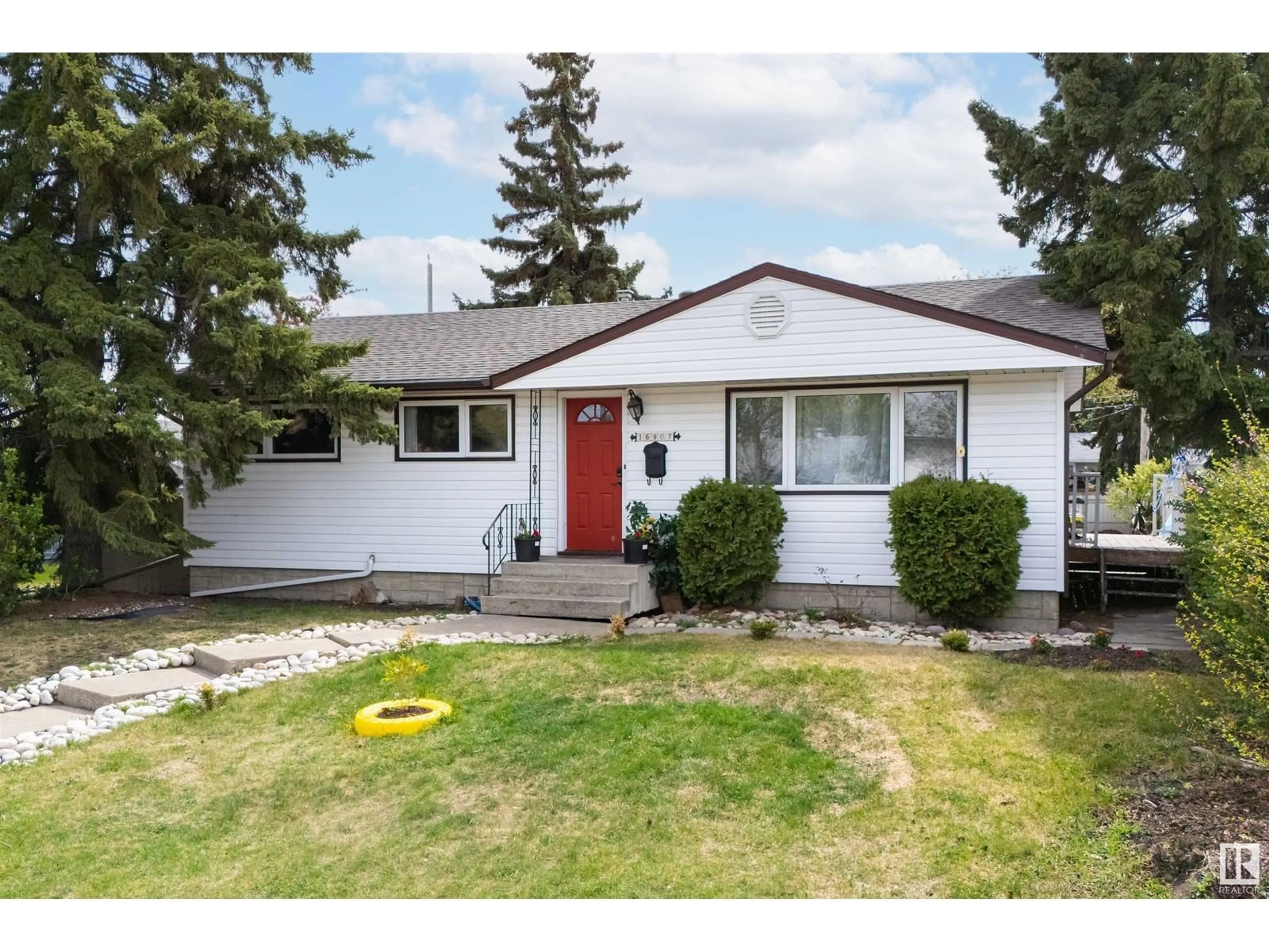 Home with vinyl exterior material, street for 16907 81 AV, Edmonton Alberta T5R3R1