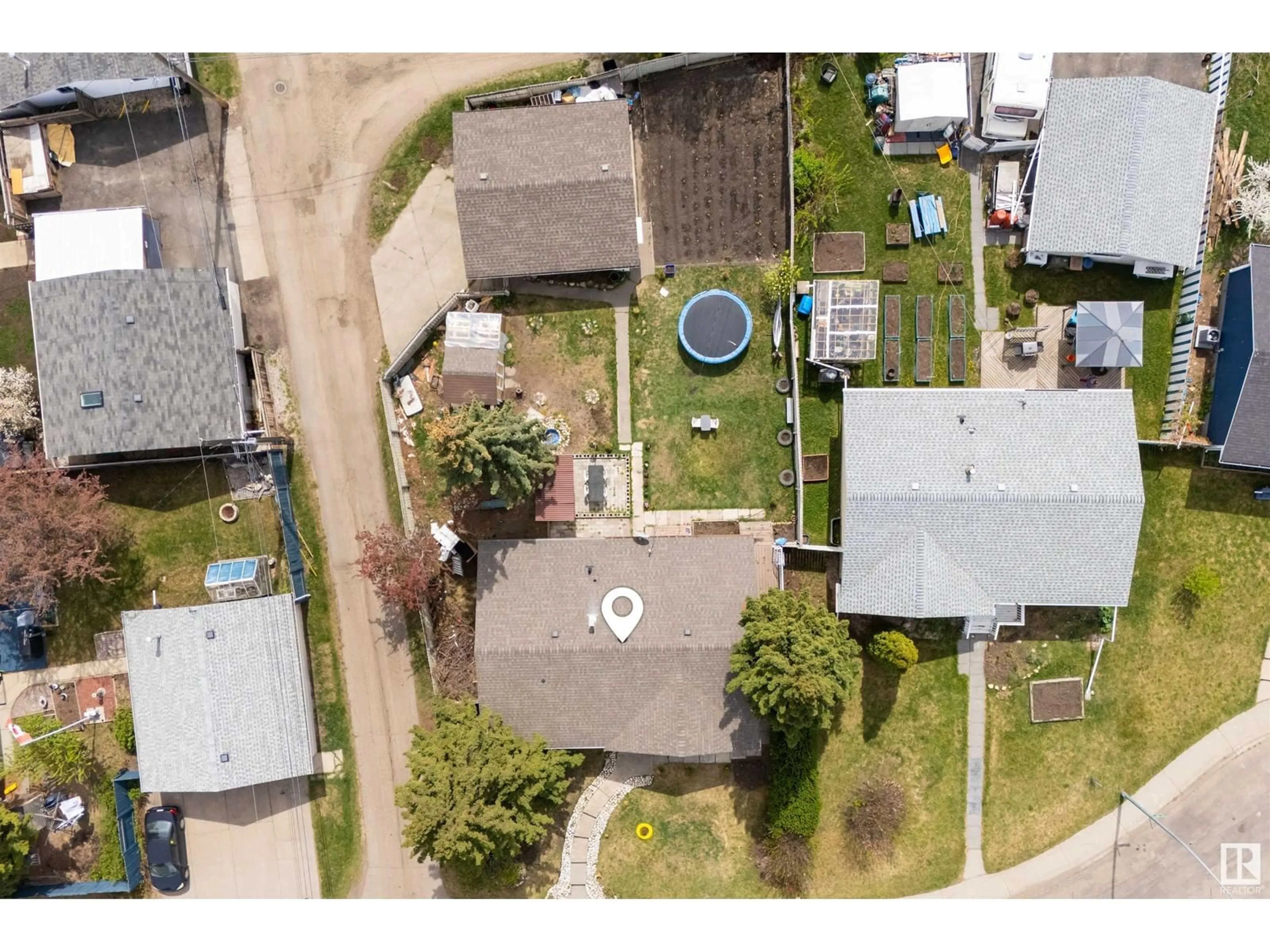 A pic from outside/outdoor area/front of a property/back of a property/a pic from drone, street for 16907 81 AV, Edmonton Alberta T5R3R1
