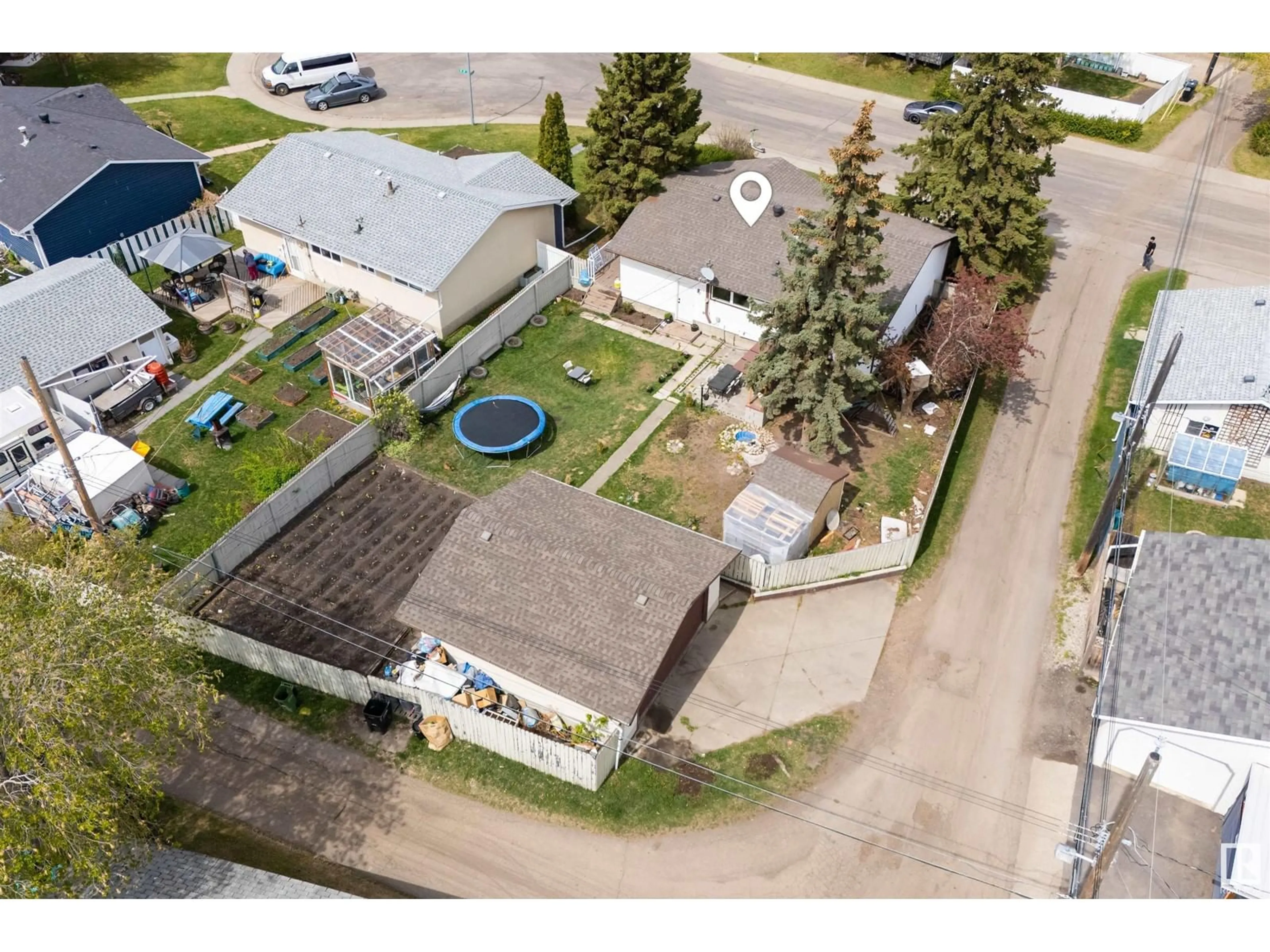 A pic from outside/outdoor area/front of a property/back of a property/a pic from drone, street for 16907 81 AV, Edmonton Alberta T5R3R1