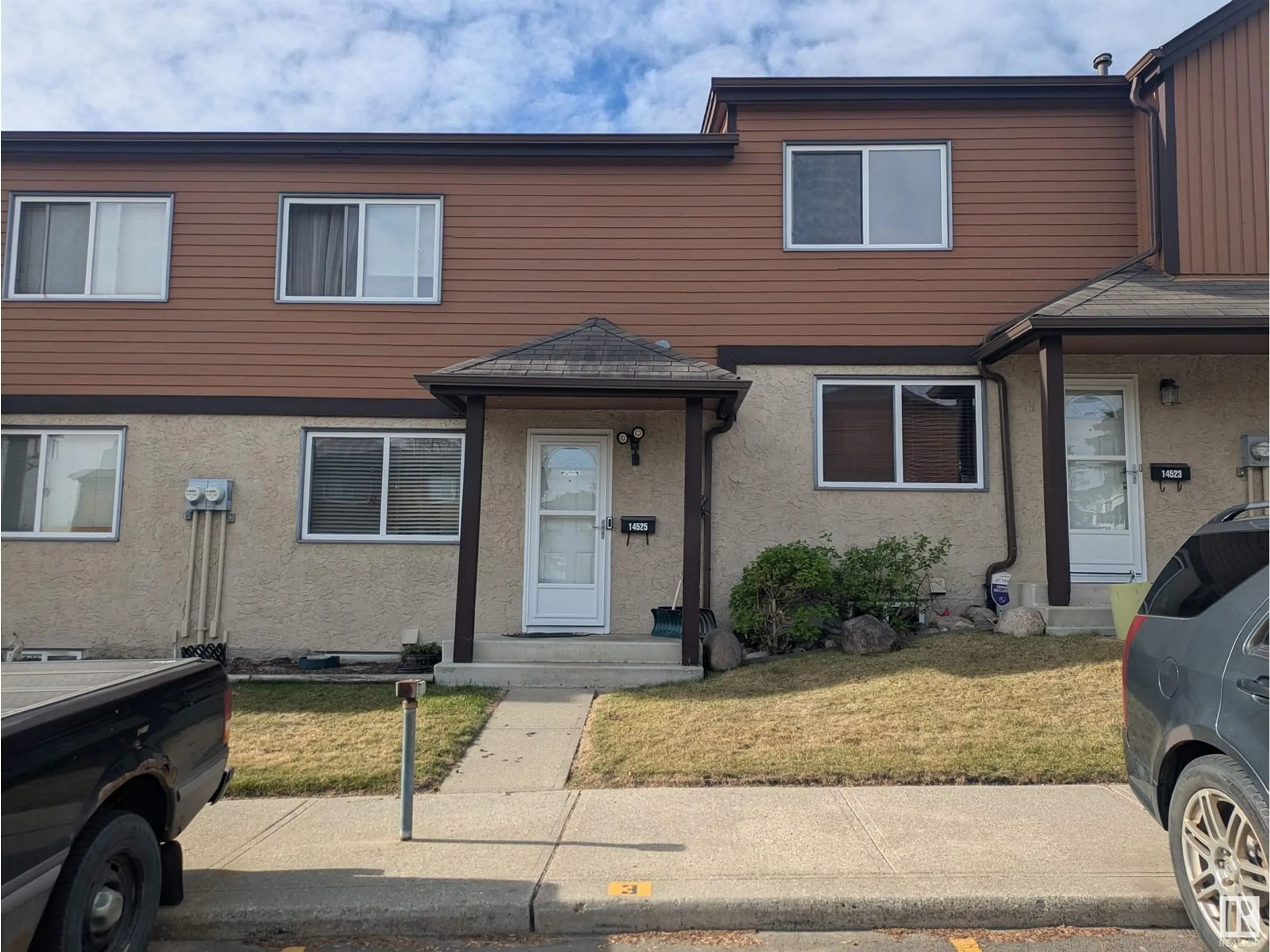Home with vinyl exterior material, street for NW - 14525 52 ST, Edmonton Alberta T5A4N1
