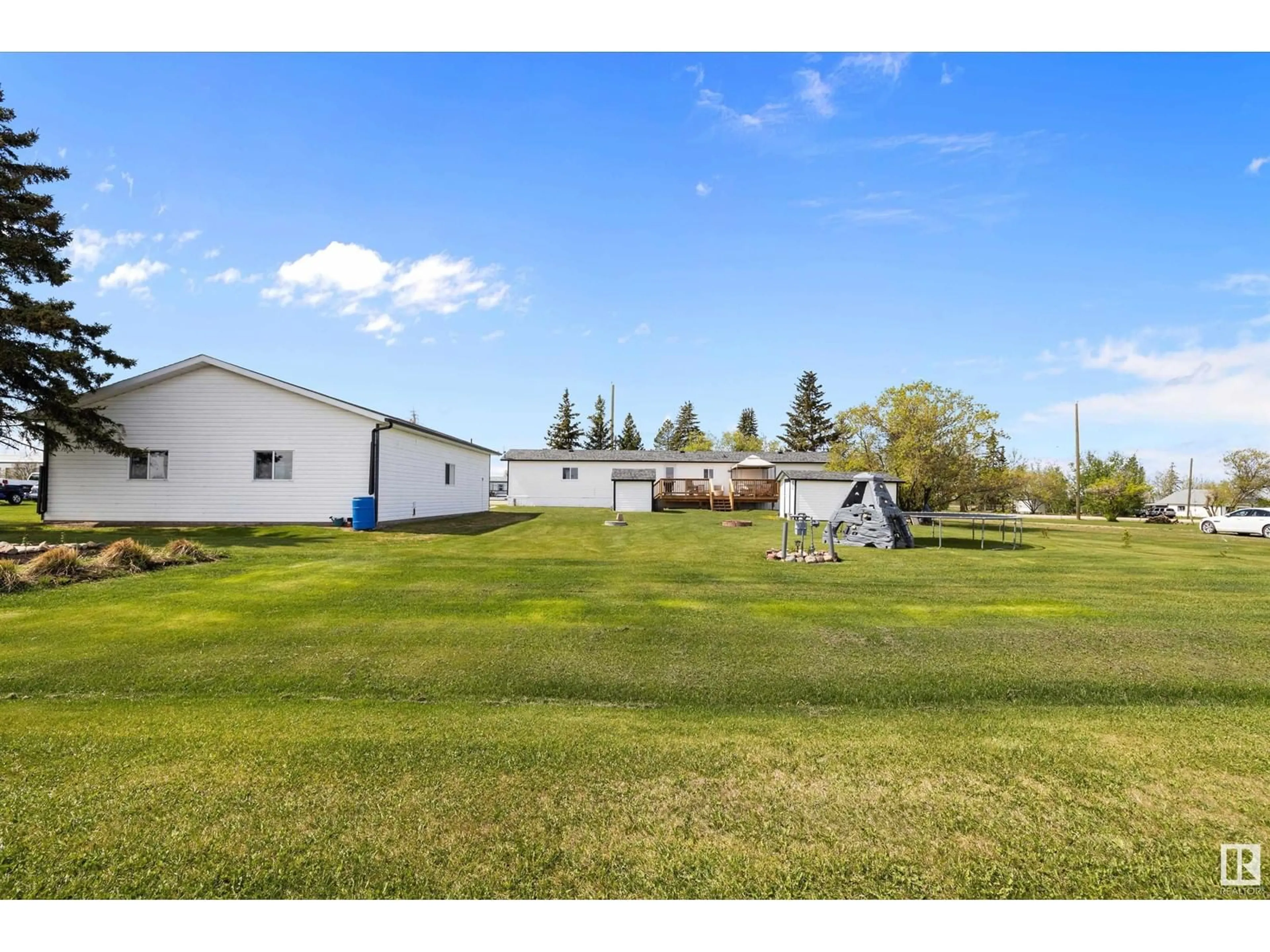 A pic from outside/outdoor area/front of a property/back of a property/a pic from drone, water/lake/river/ocean view for #21 - 56227 HWY 33, Rural Lac Ste. Anne County Alberta T0G1L0
