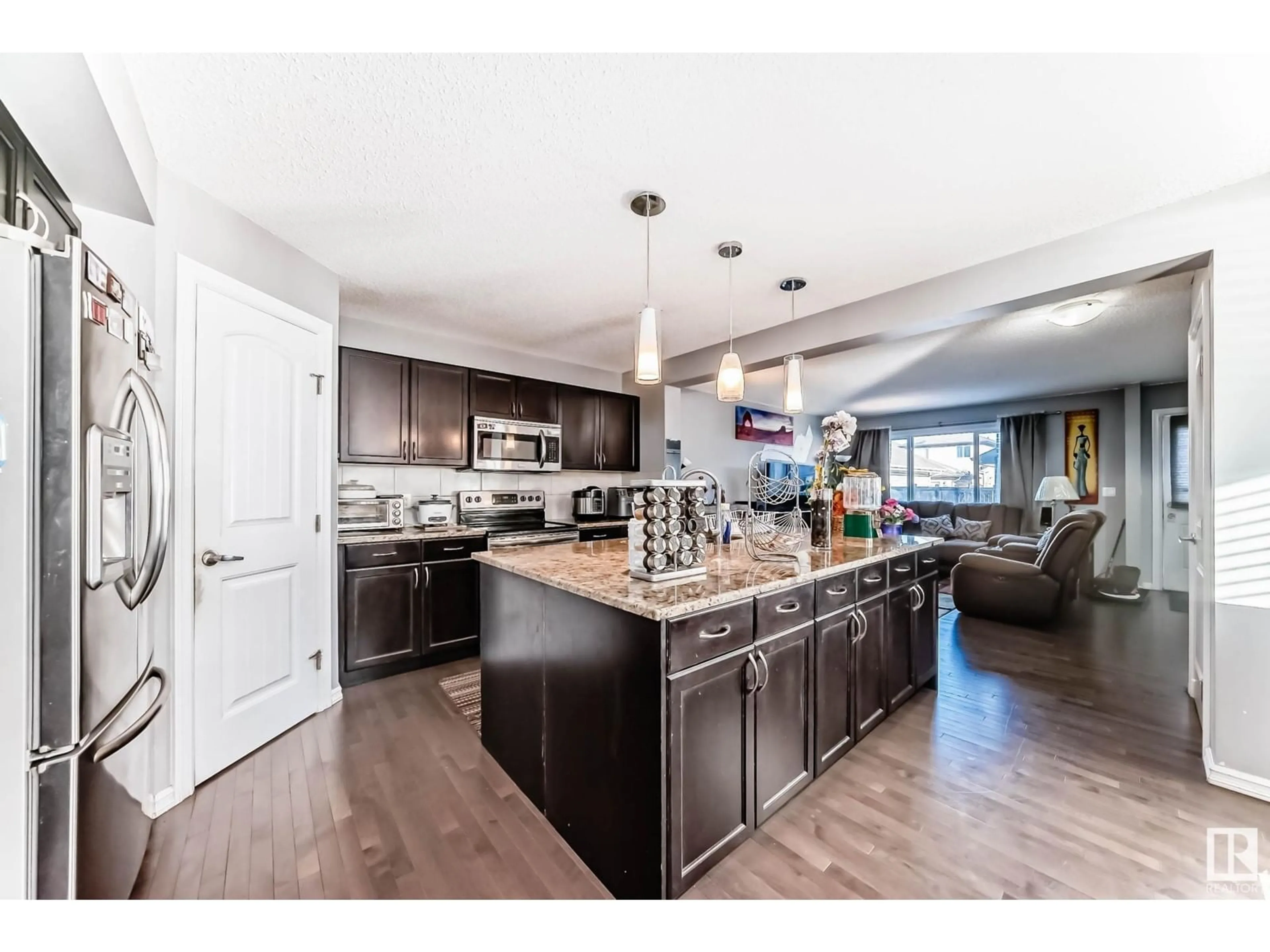 Open concept kitchen, unknown for NW - 1839 32 ST, Edmonton Alberta T6T0N7