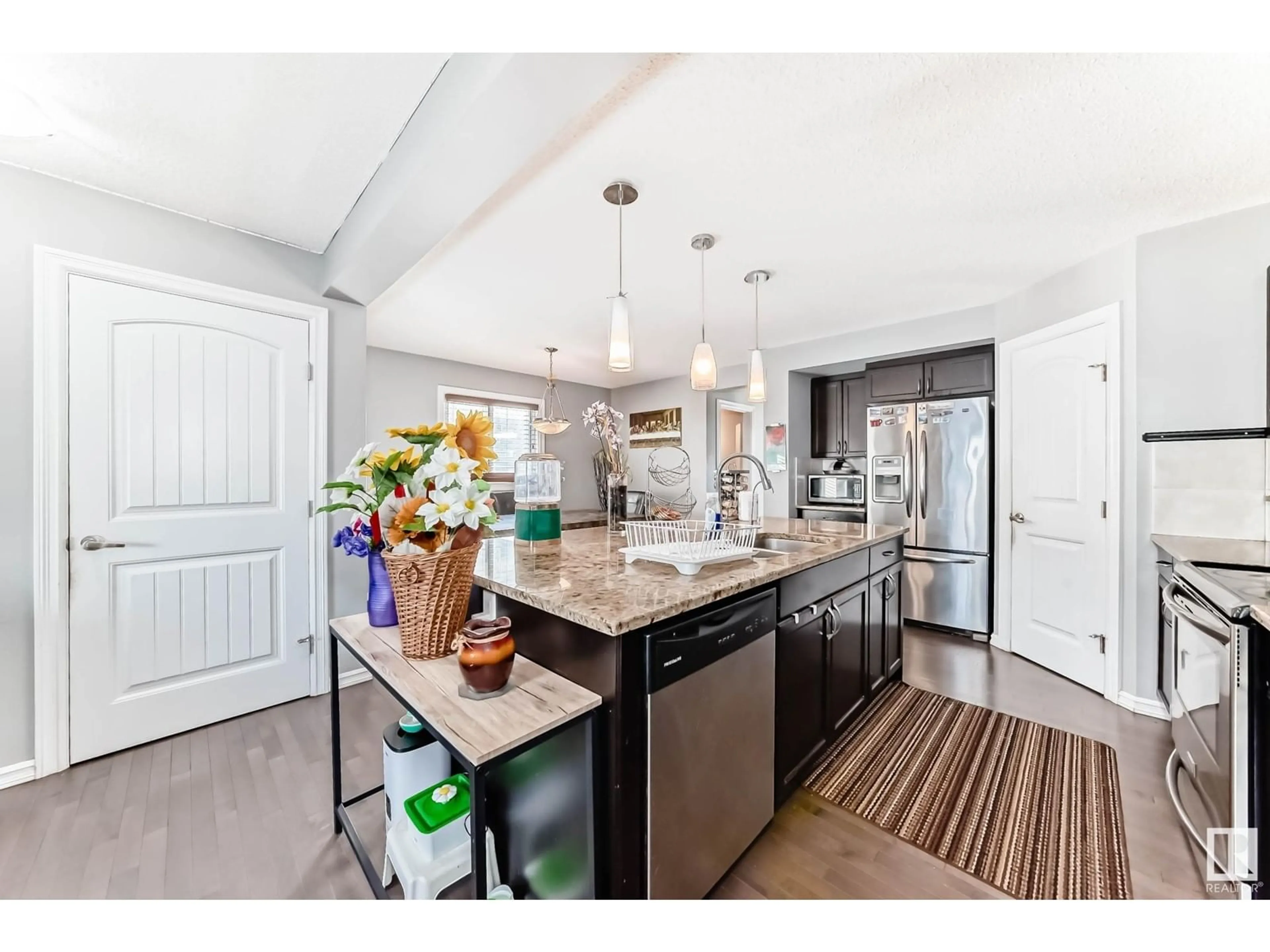 Open concept kitchen, unknown for NW - 1839 32 ST, Edmonton Alberta T6T0N7