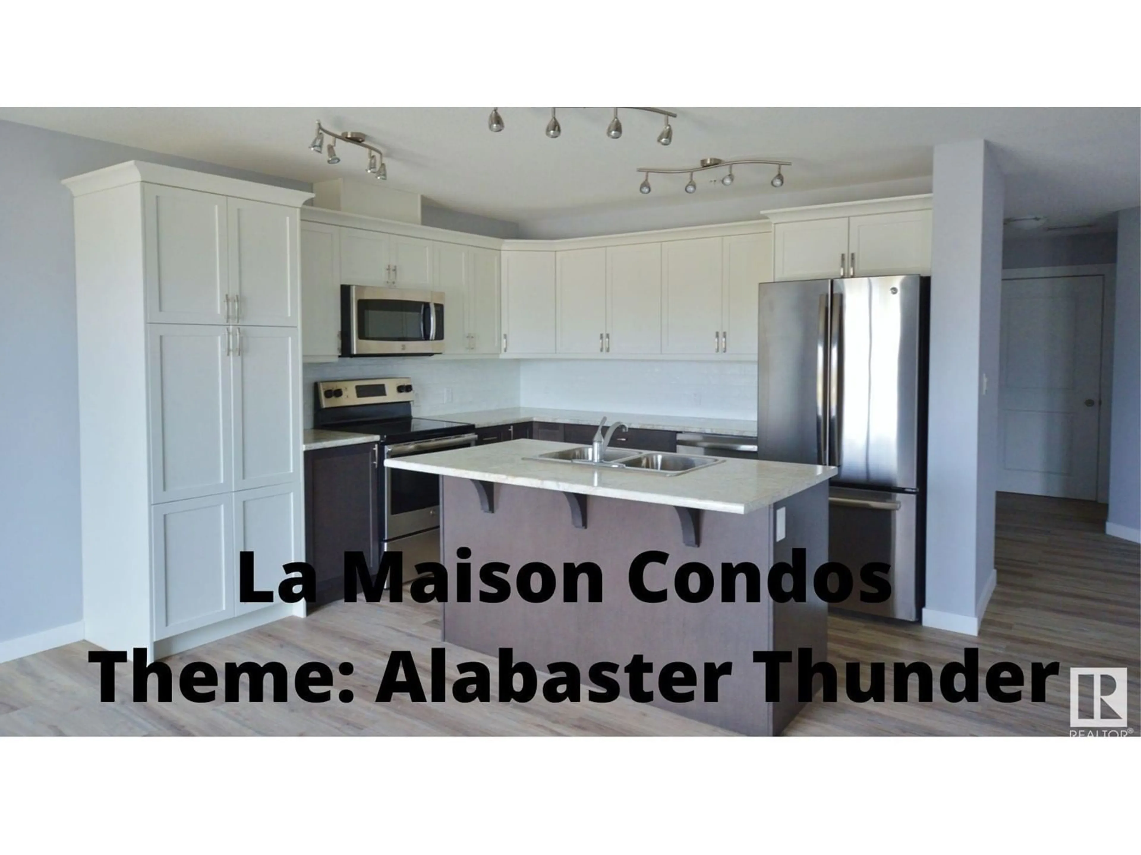 Open concept kitchen, wood/laminate floor for 203 - 4110 43 AV, Bonnyville Town Alberta T9N1S8