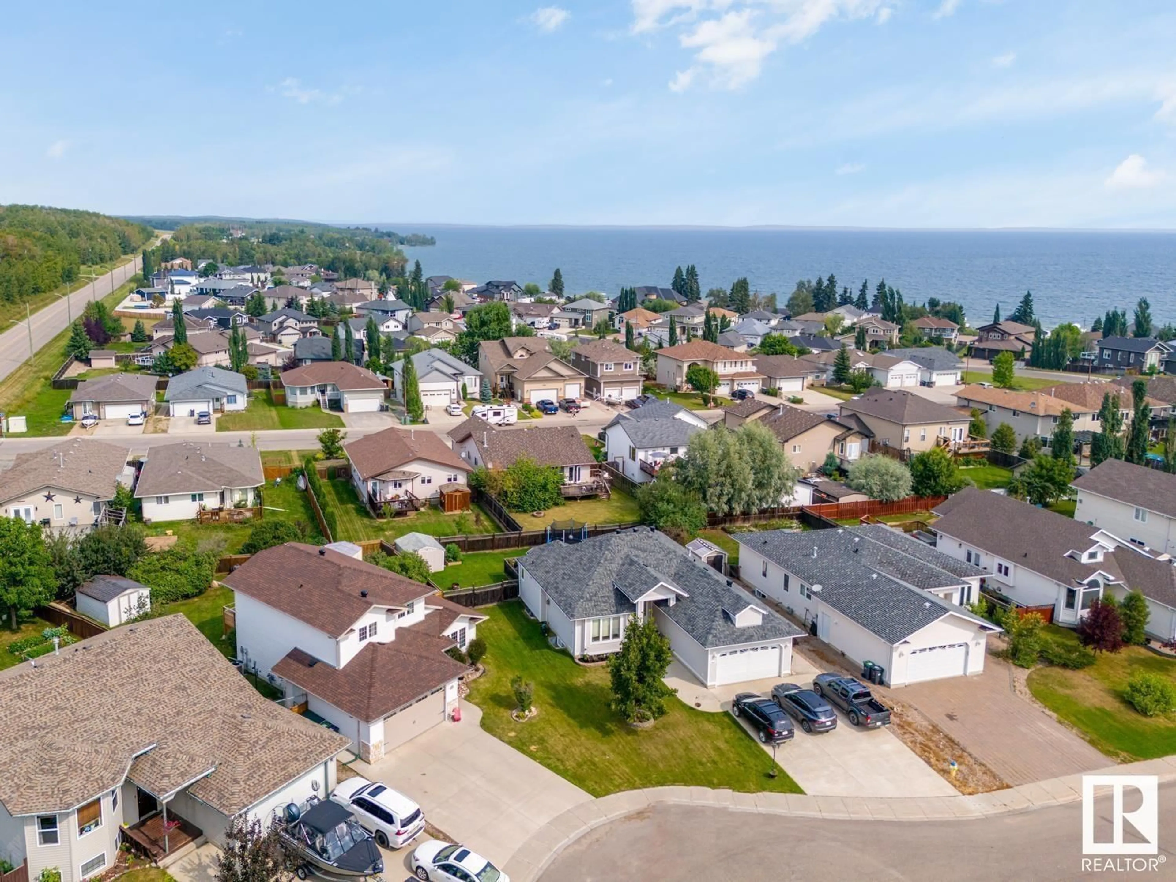A pic from outside/outdoor area/front of a property/back of a property/a pic from drone, water/lake/river/ocean view for 2617 6A AV, Cold Lake Alberta T9M2C7