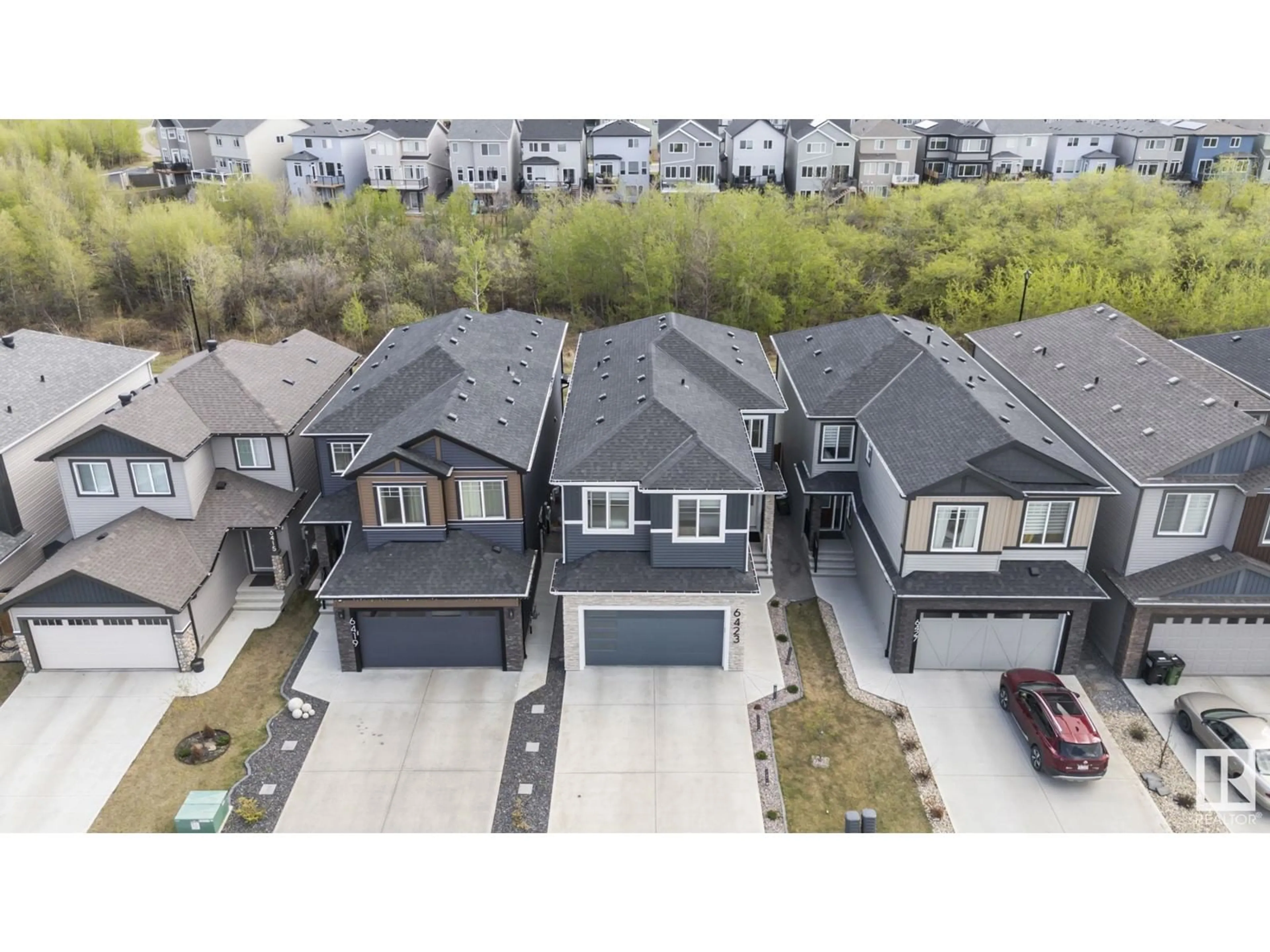 A pic from outside/outdoor area/front of a property/back of a property/a pic from drone, street for NW - 6423 175 AV, Edmonton Alberta T5Y4A8