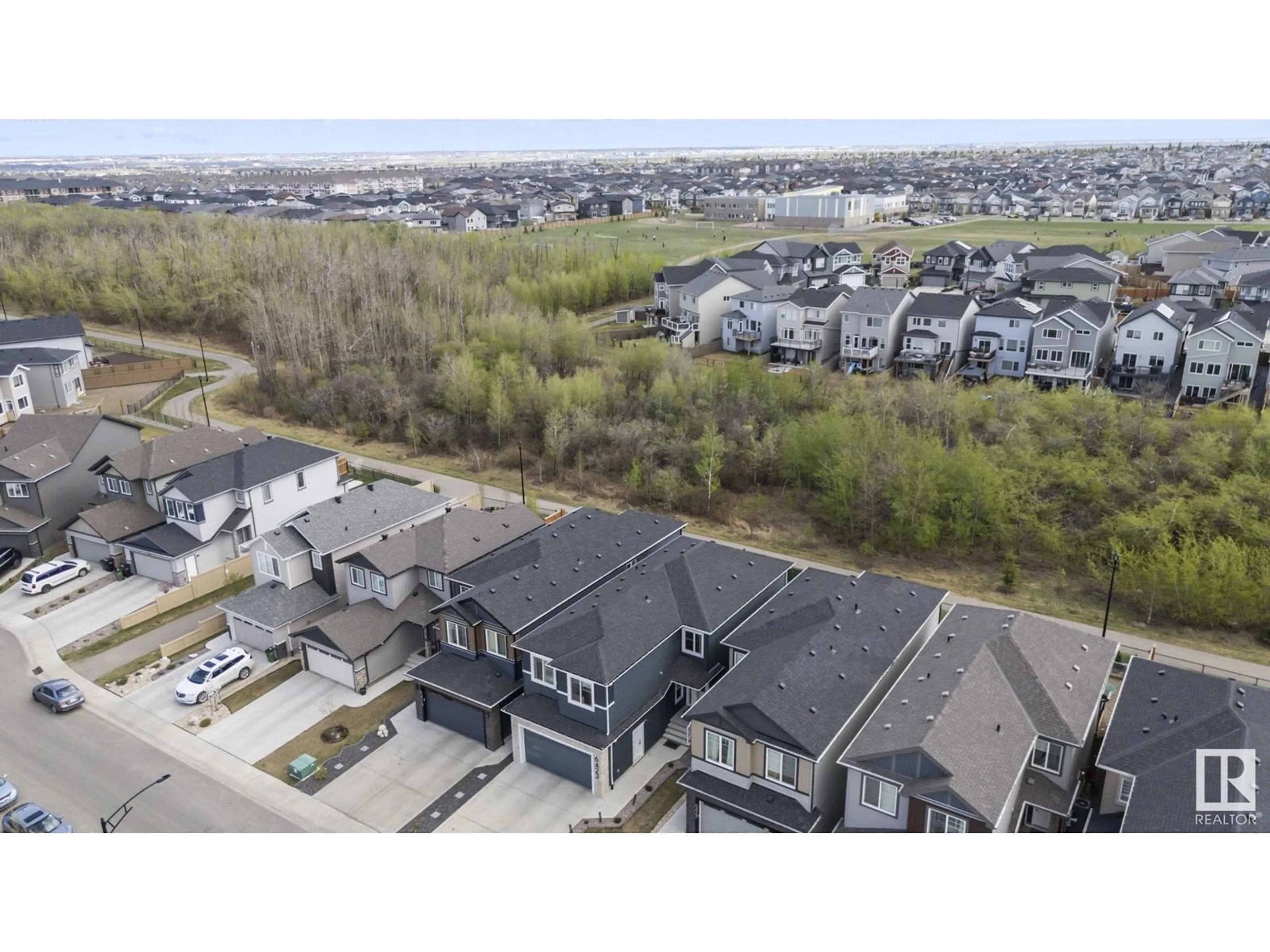 A pic from outside/outdoor area/front of a property/back of a property/a pic from drone, unknown for NW - 6423 175 AV, Edmonton Alberta T5Y4A8