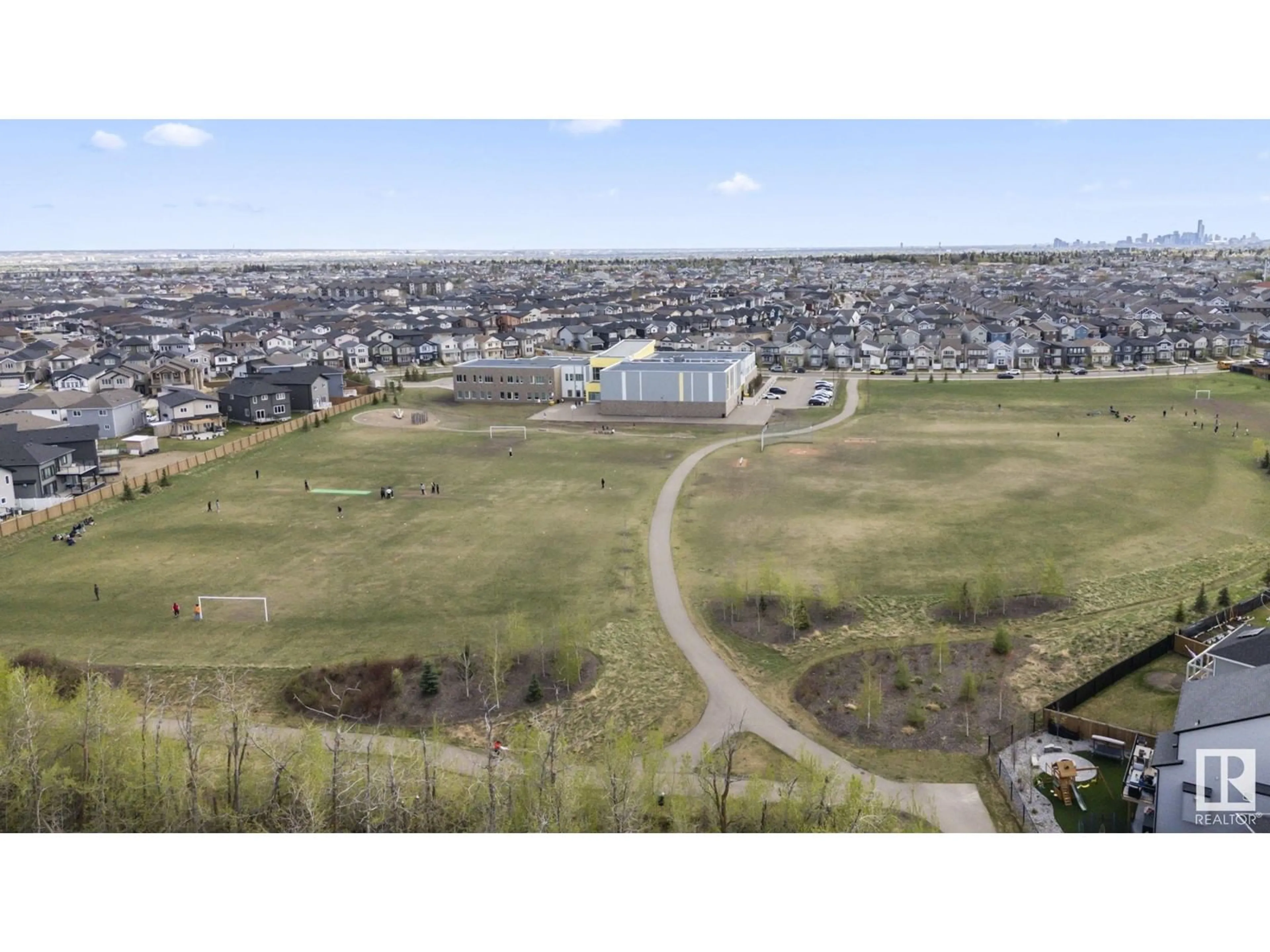 A pic from outside/outdoor area/front of a property/back of a property/a pic from drone, mountain view for NW - 6423 175 AV, Edmonton Alberta T5Y4A8