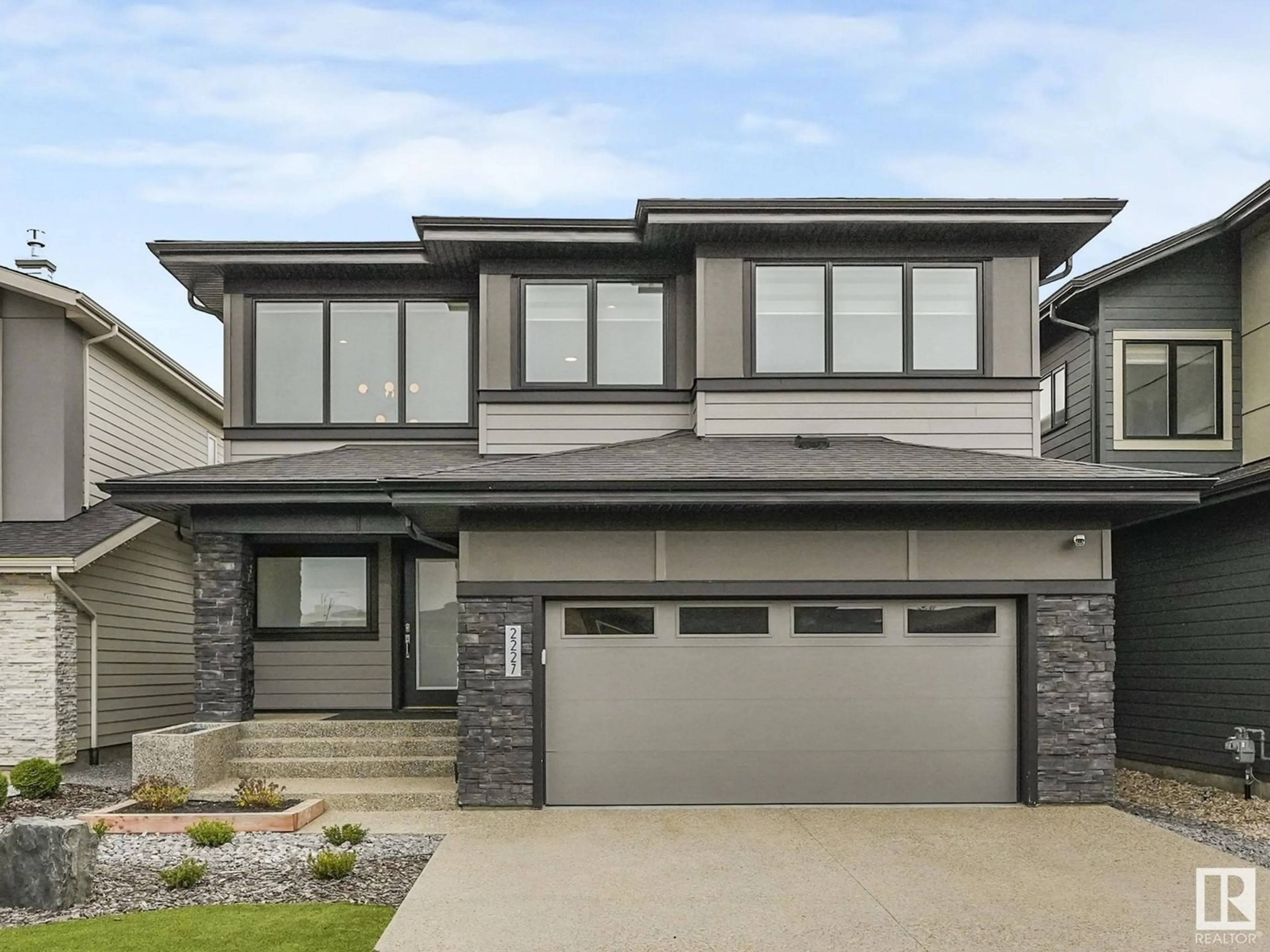 Home with brick exterior material, street for 2227 KELLY CR, Edmonton Alberta T6W3R8