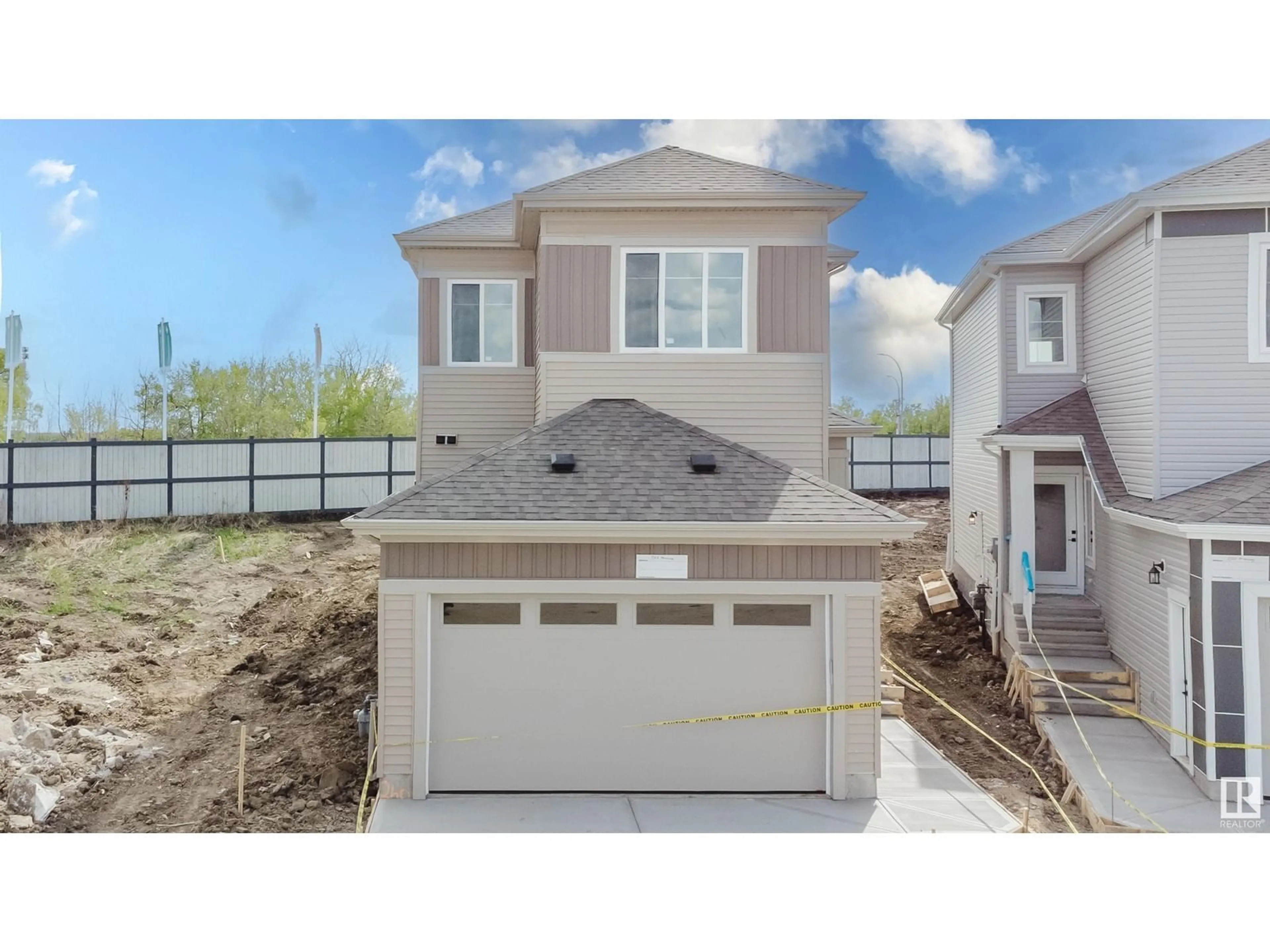 Home with vinyl exterior material, street for 262 MUNN WY, Leduc Alberta T9E0S9