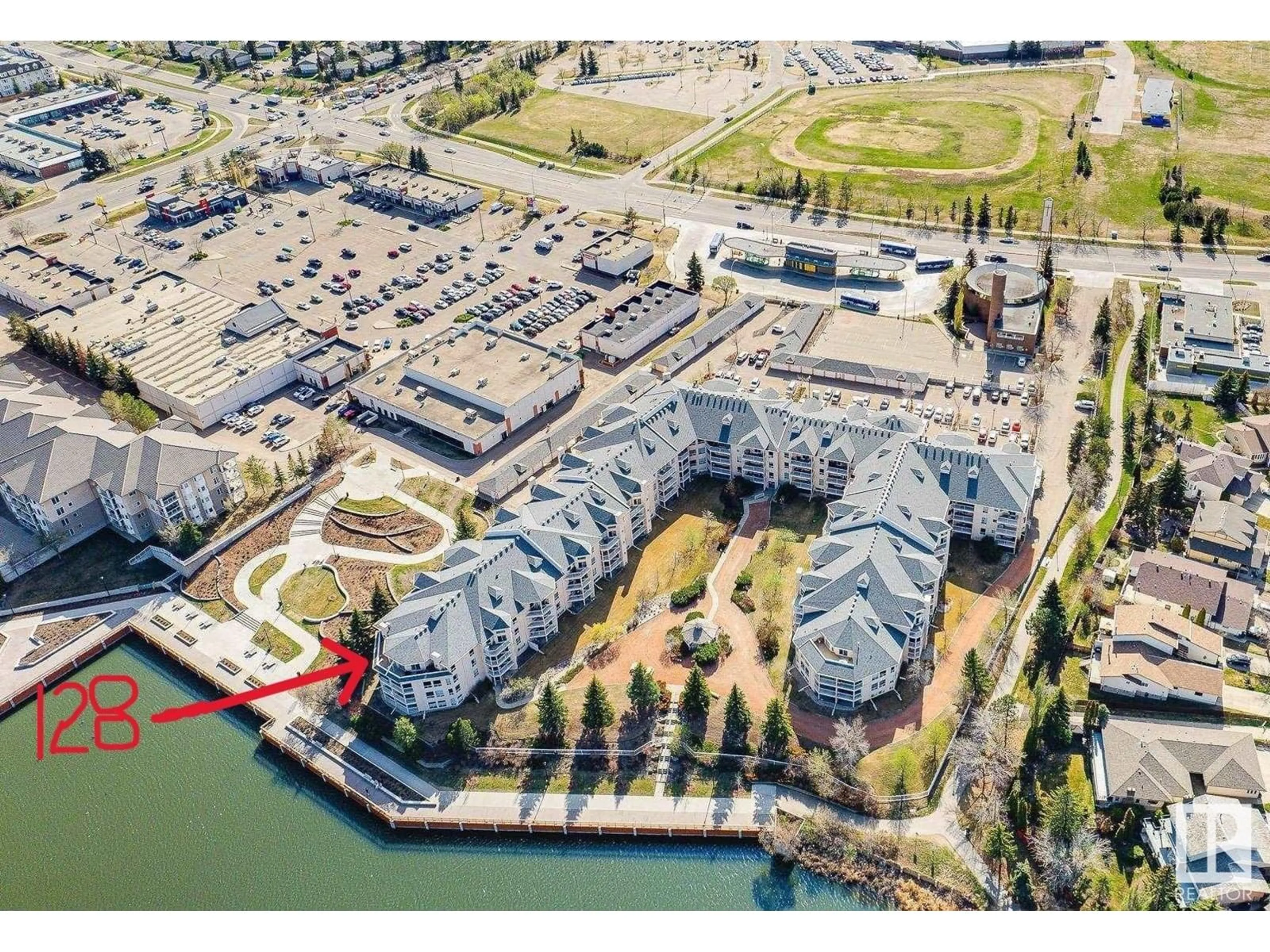 A pic from outside/outdoor area/front of a property/back of a property/a pic from drone, water/lake/river/ocean view for 128 15499 CASTLE DOWNS RD, Edmonton Alberta T5K5Y3
