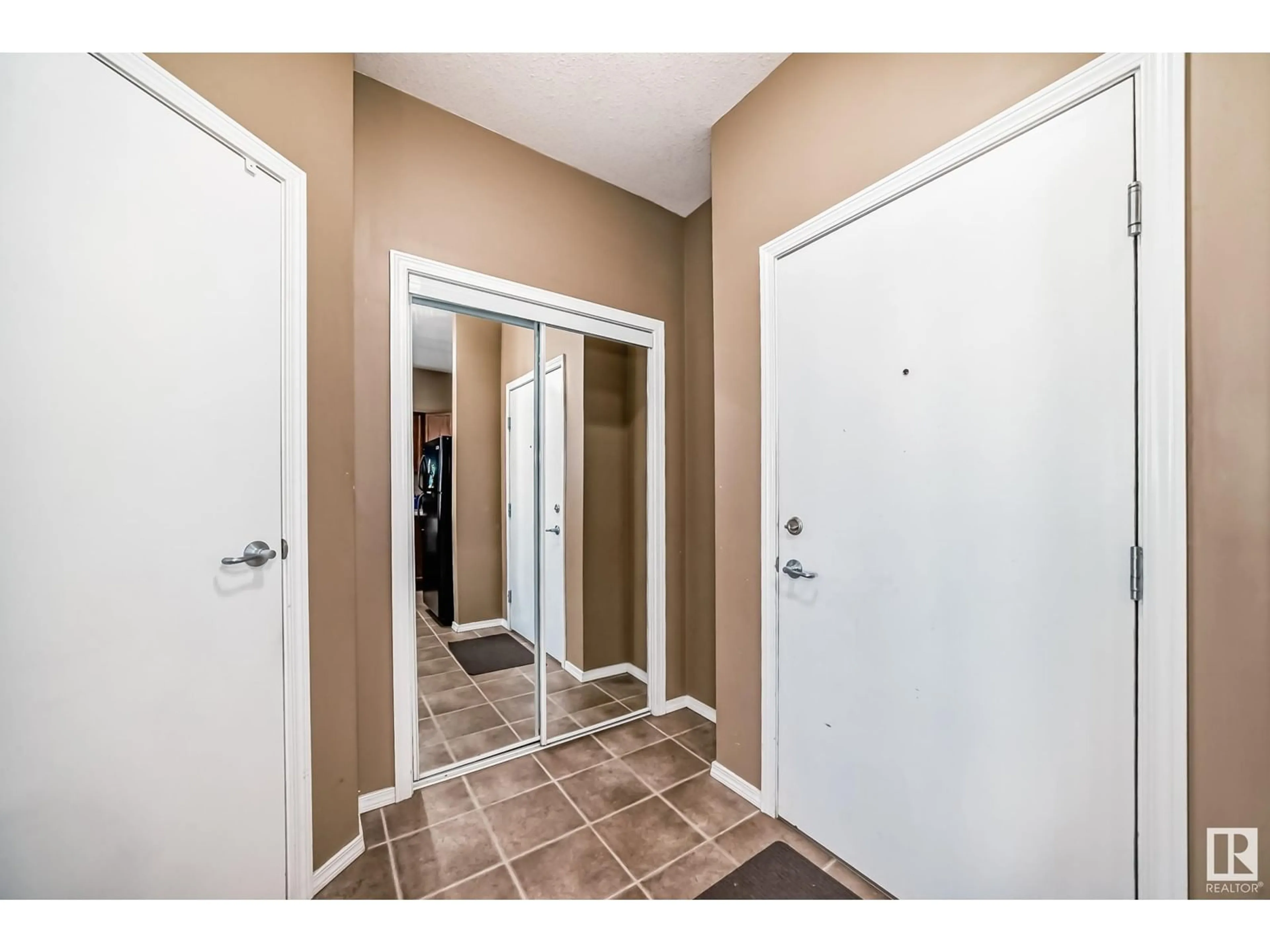 Indoor entryway for #409 - 4316 139 AV, Edmonton Alberta T5Y0L1
