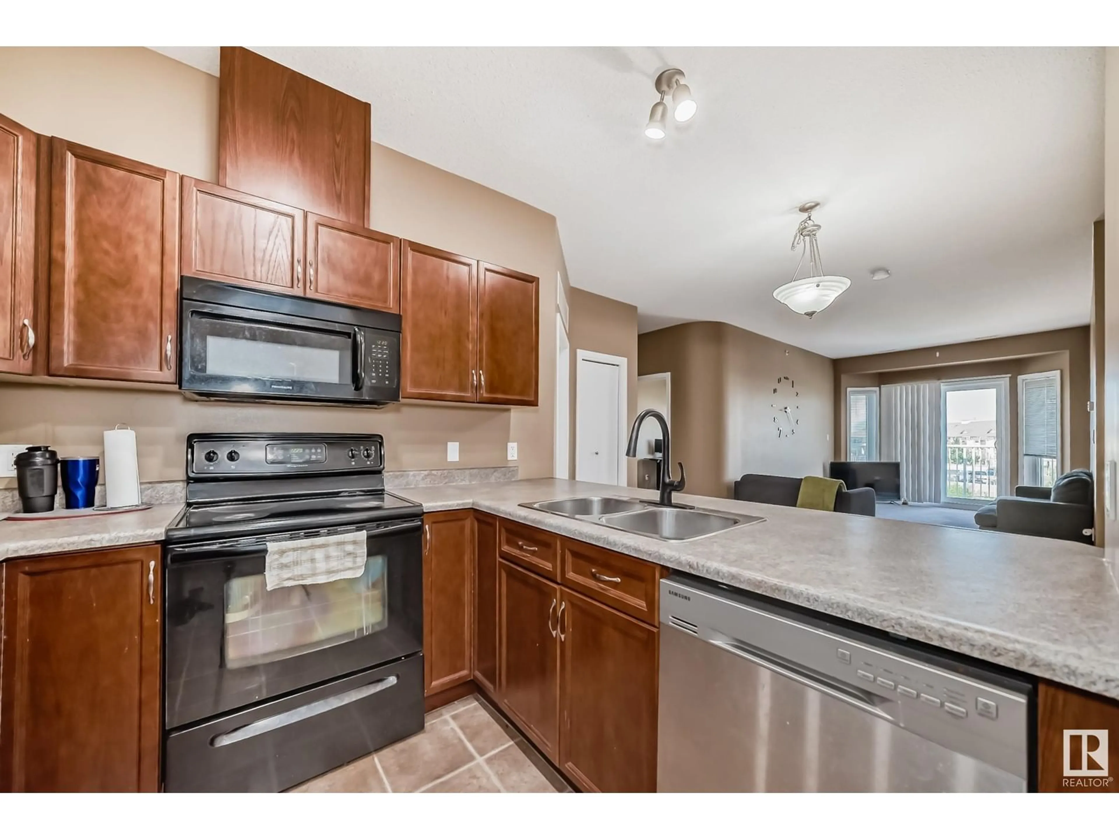 Open concept kitchen, unknown for #409 - 4316 139 AV, Edmonton Alberta T5Y0L1