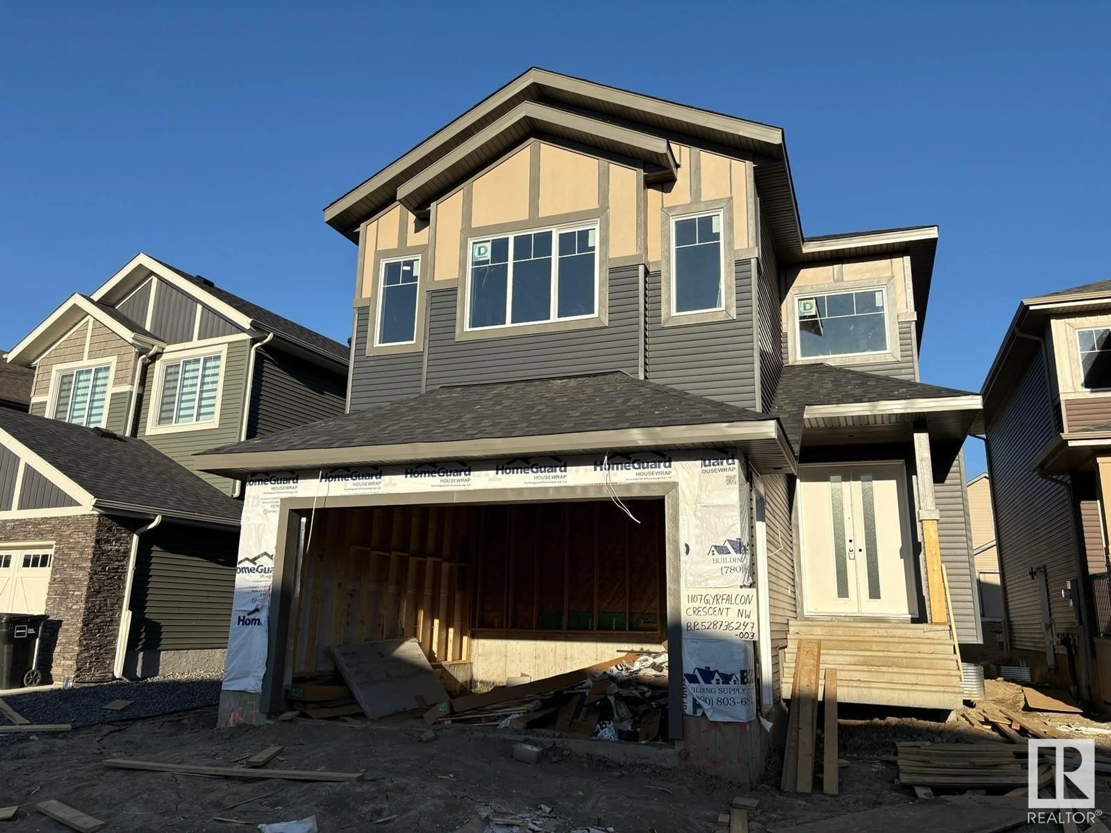Home with vinyl exterior material, street for 1107 GYRFALCON CR, Edmonton Alberta T5S0S5