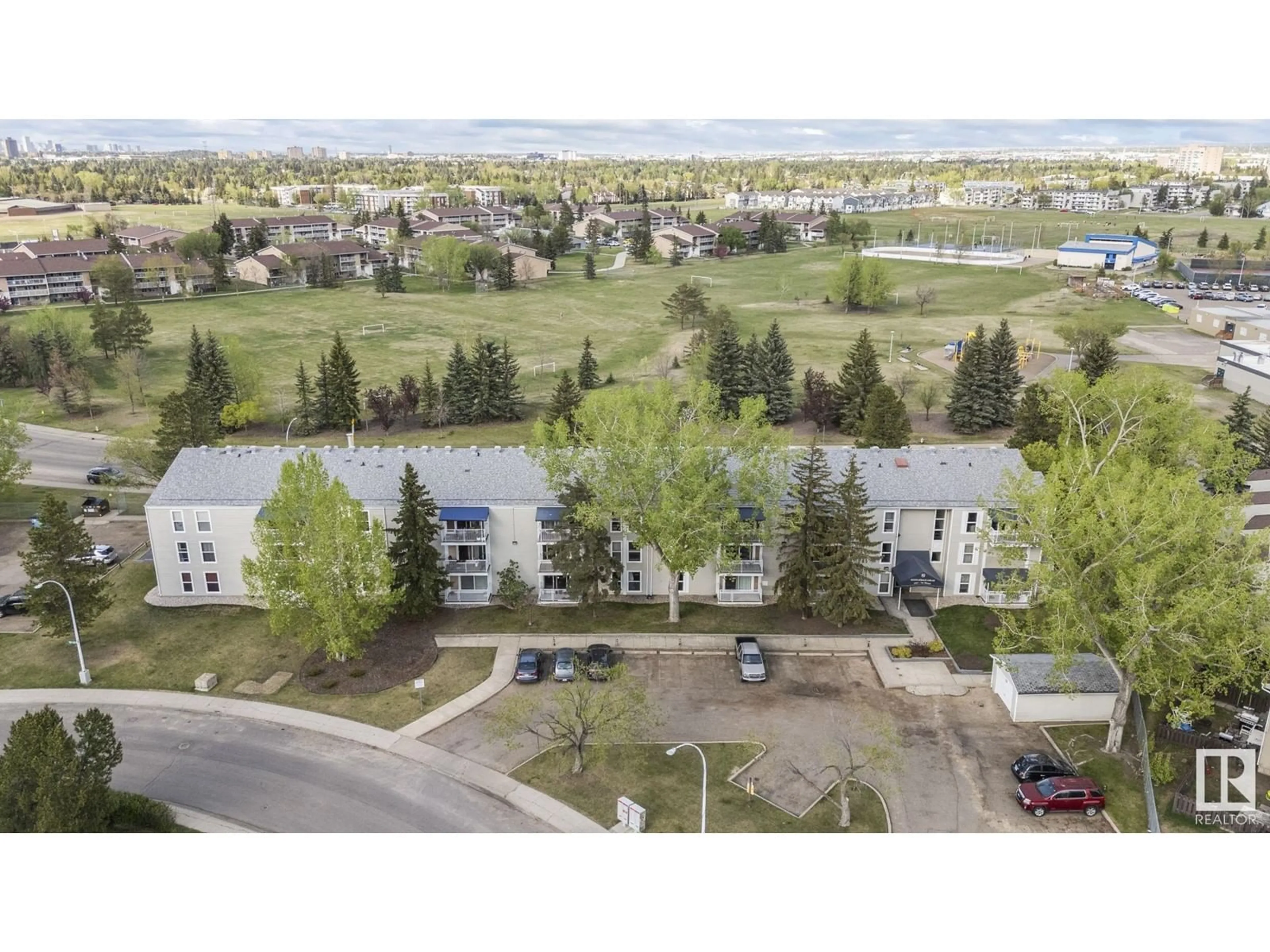 A pic from outside/outdoor area/front of a property/back of a property/a pic from drone, mountain view for #204 - 2545 116 ST, Edmonton Alberta T6J3Z7